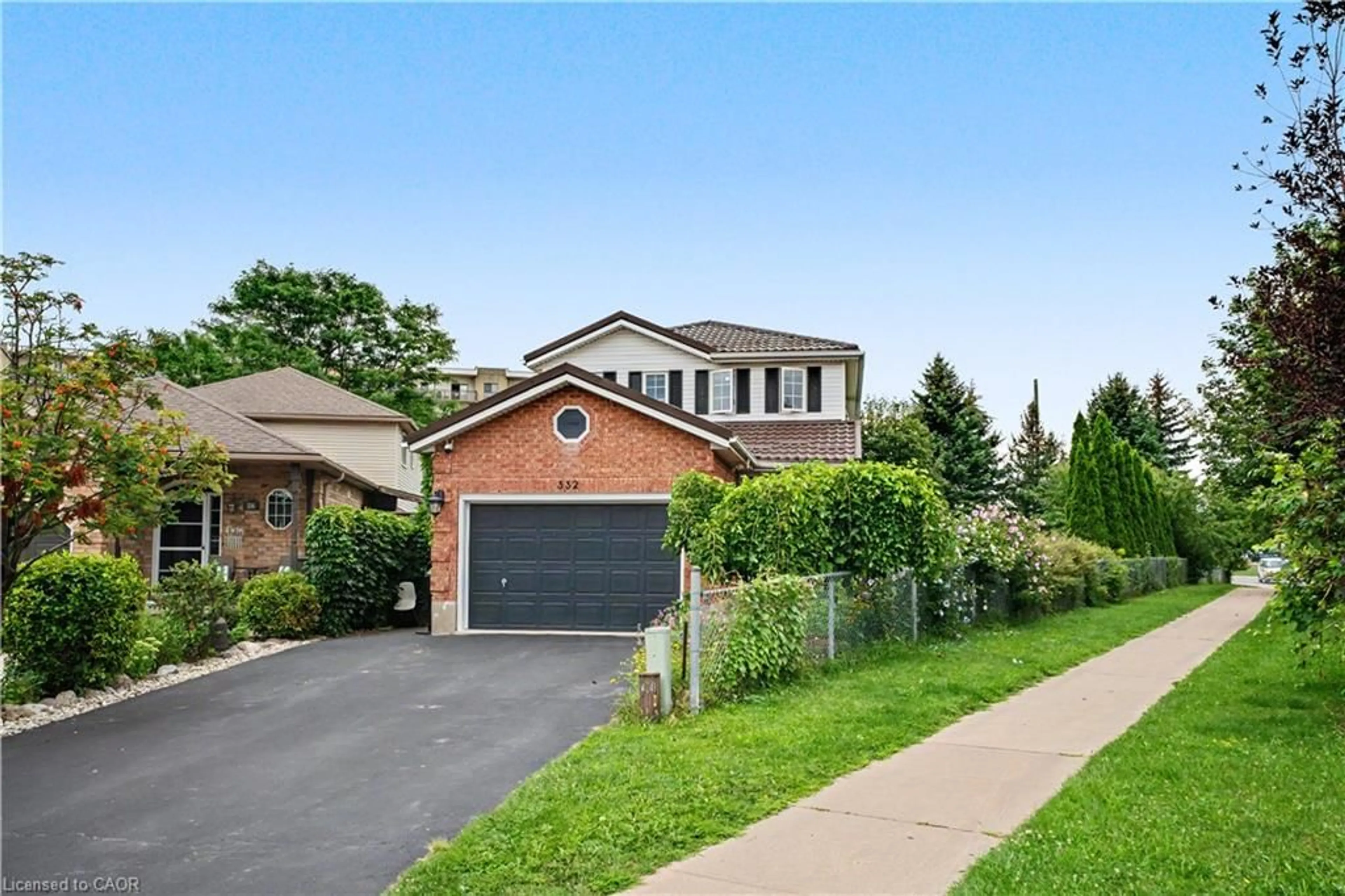 Home with brick exterior material, street for 332 Brembel Cres, Kitchener Ontario N2B 3W9