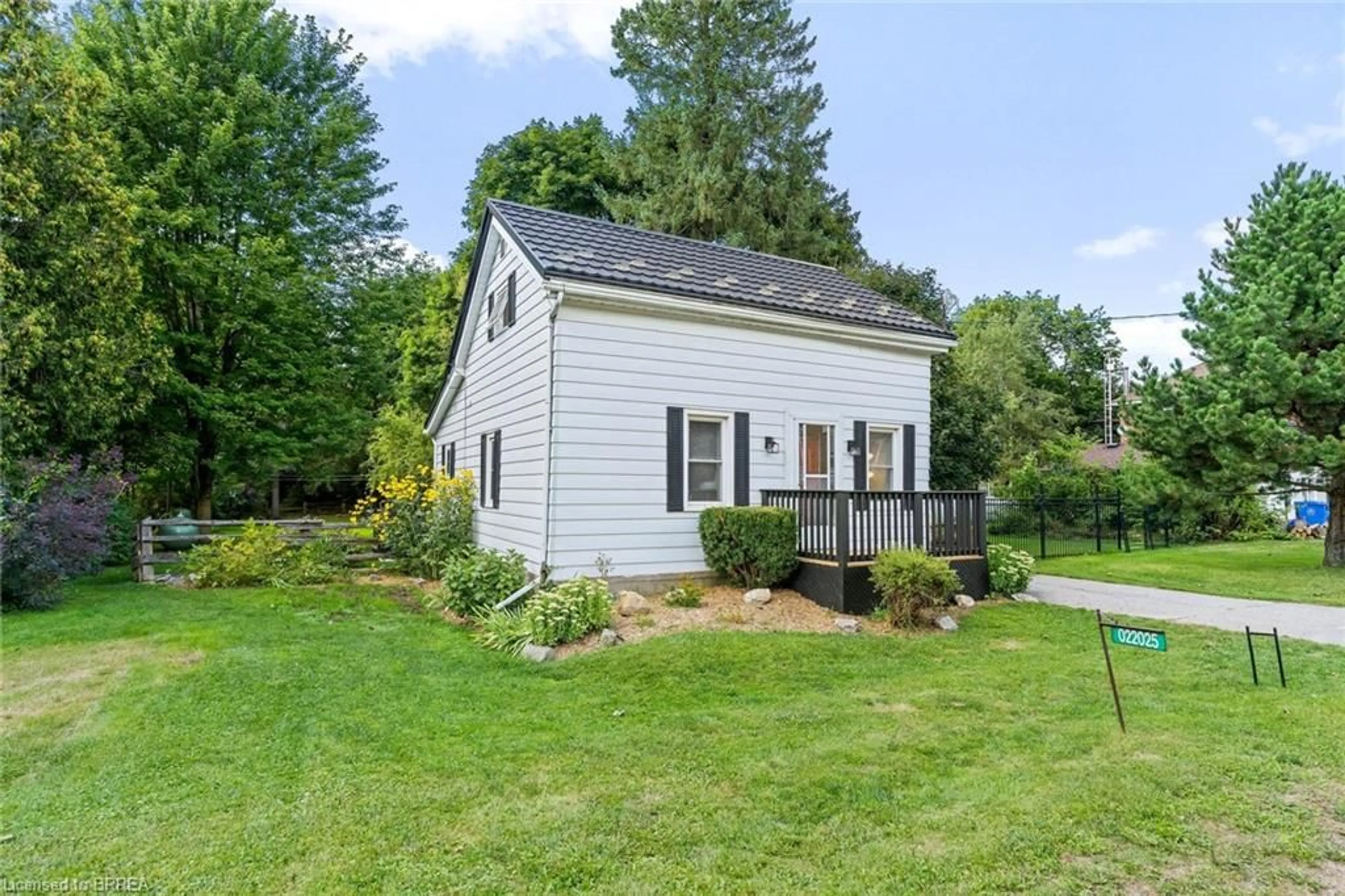 Home with vinyl exterior material, street for 22025 Erin - East Garafraxa Tline, East Garafraxa Ontario L9W 7G4