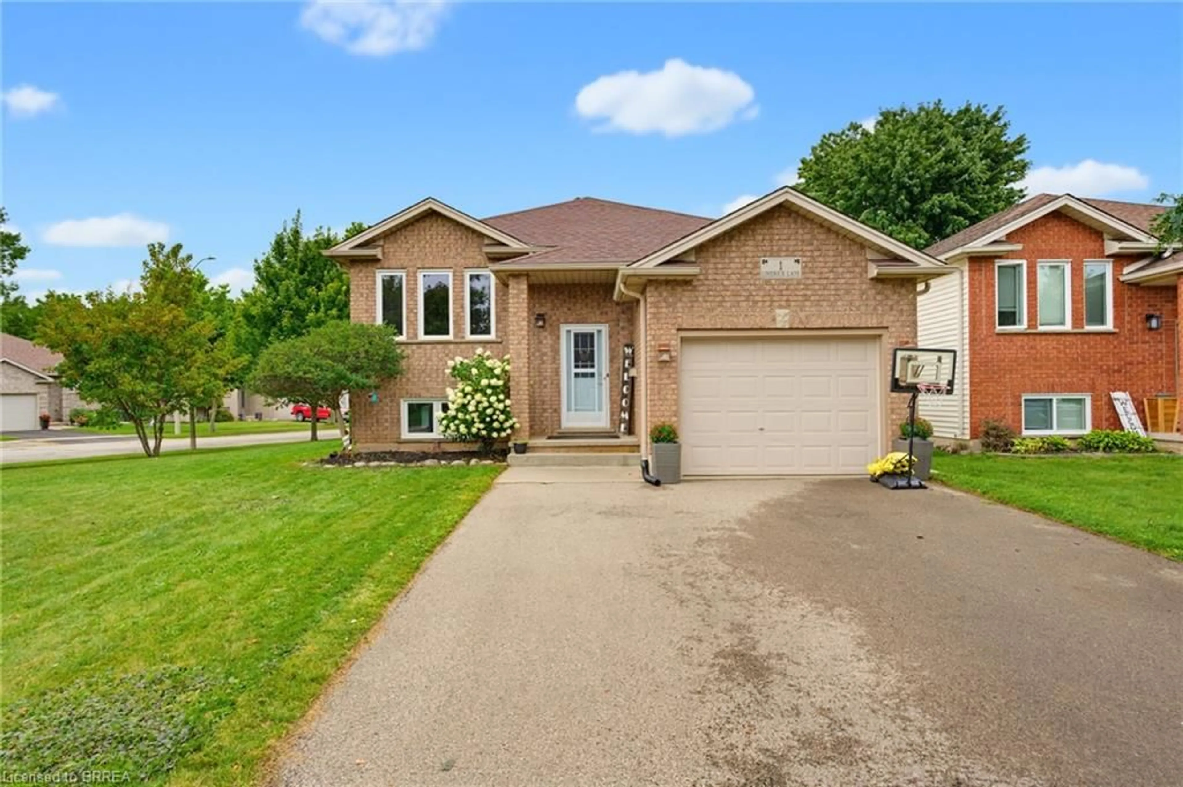 Home with brick exterior material, street for 1 Limerick Lane, Brantford Ontario N3T 6K8