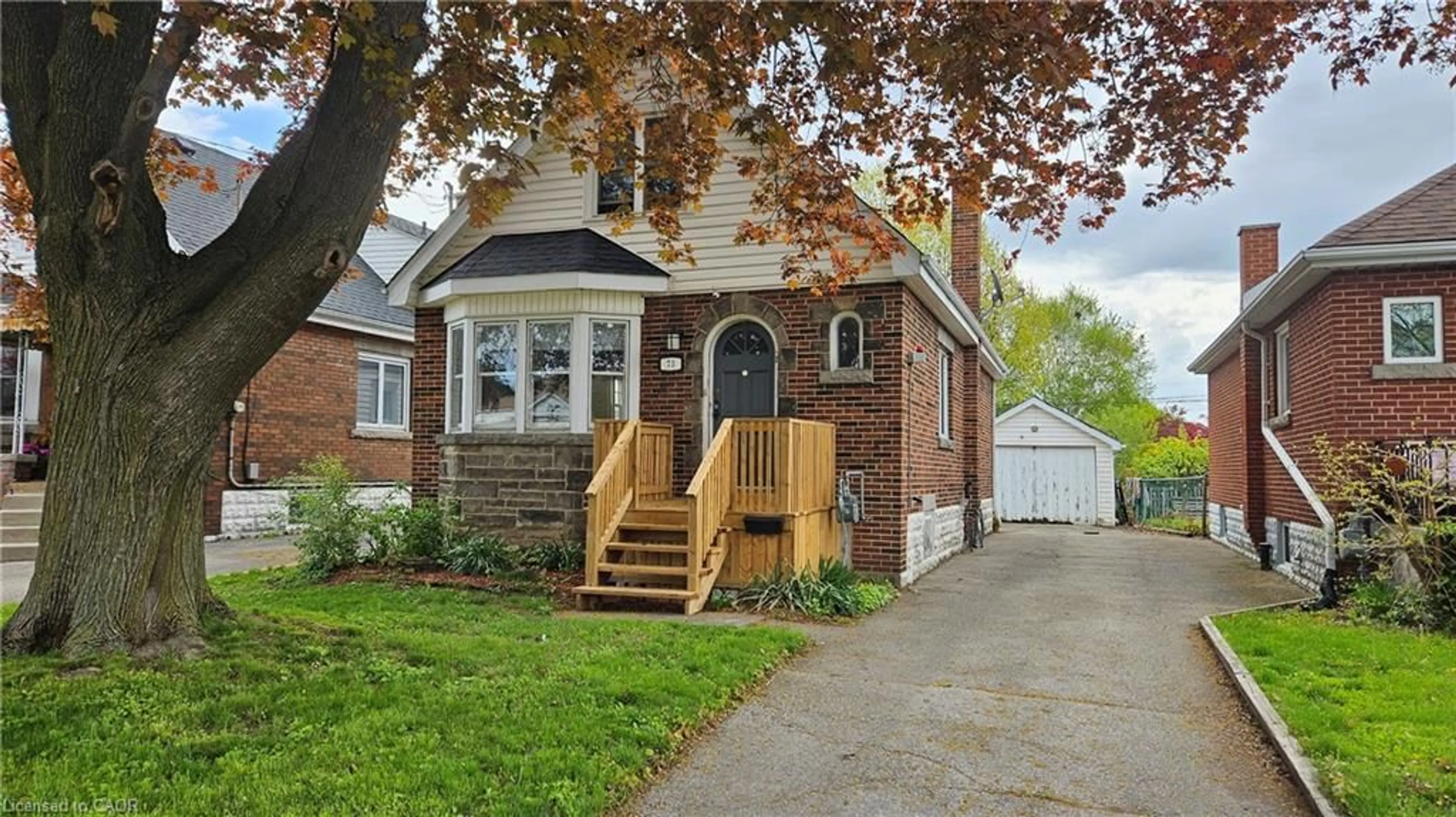 Home with brick exterior material, street for 75 Barons Ave, Hamilton Ontario L8K 2Y4