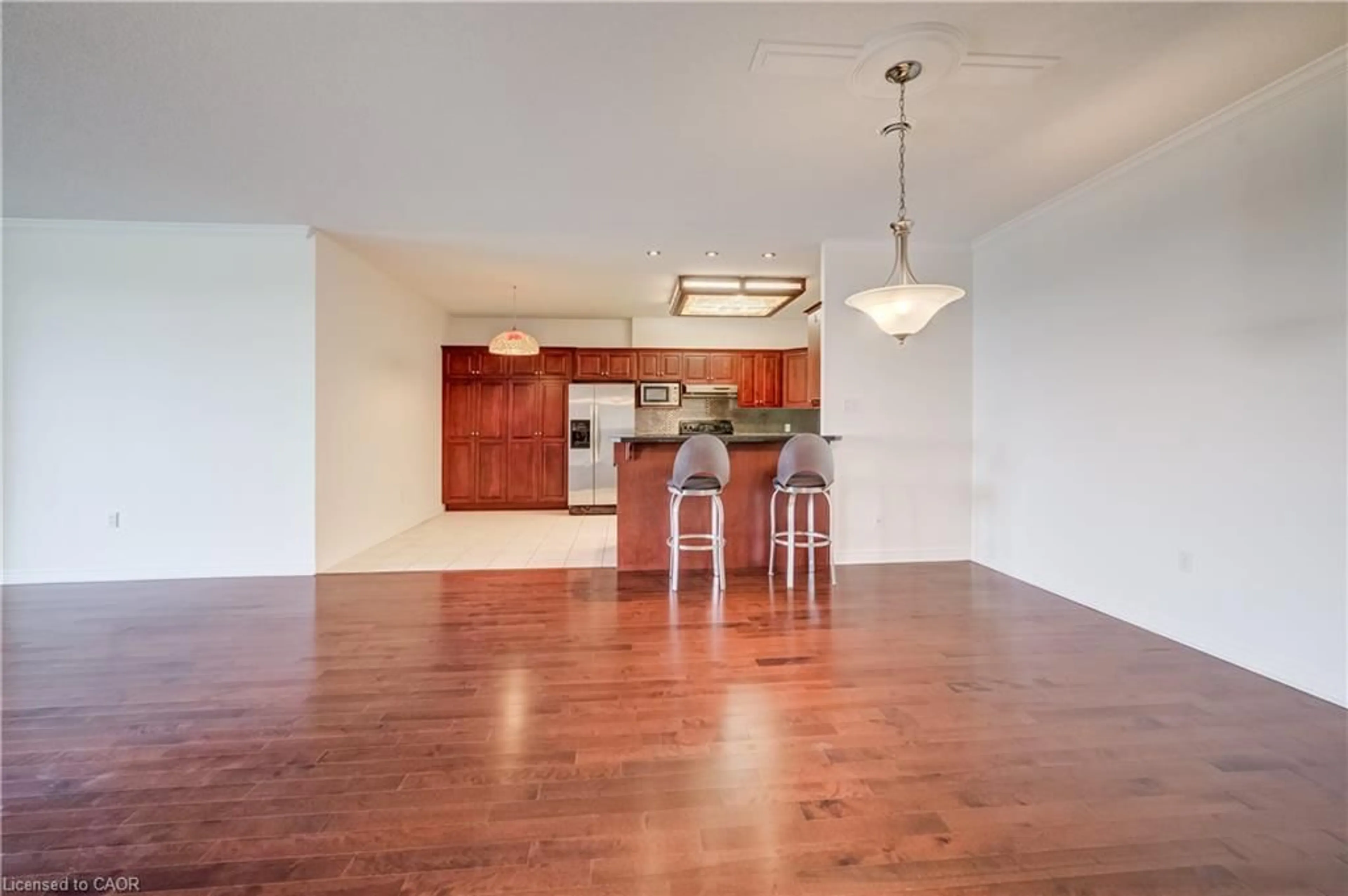 Open concept kitchen, wood/laminate floor for 255 Keats Way #1403, Waterloo Ontario N2L 6N6