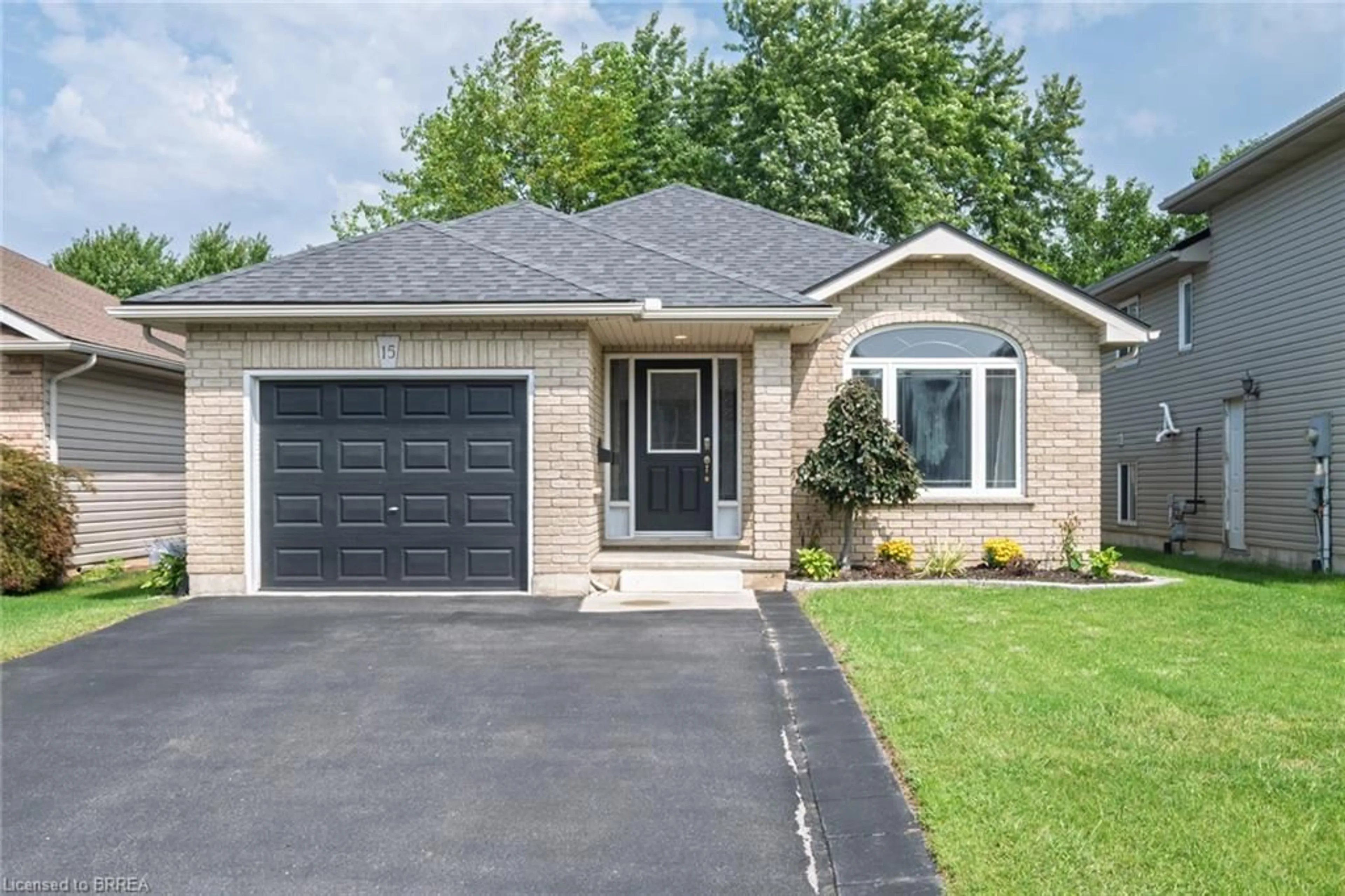 Home with brick exterior material, street for 15 Landon Ave, Simcoe Ontario N3Y 5J8