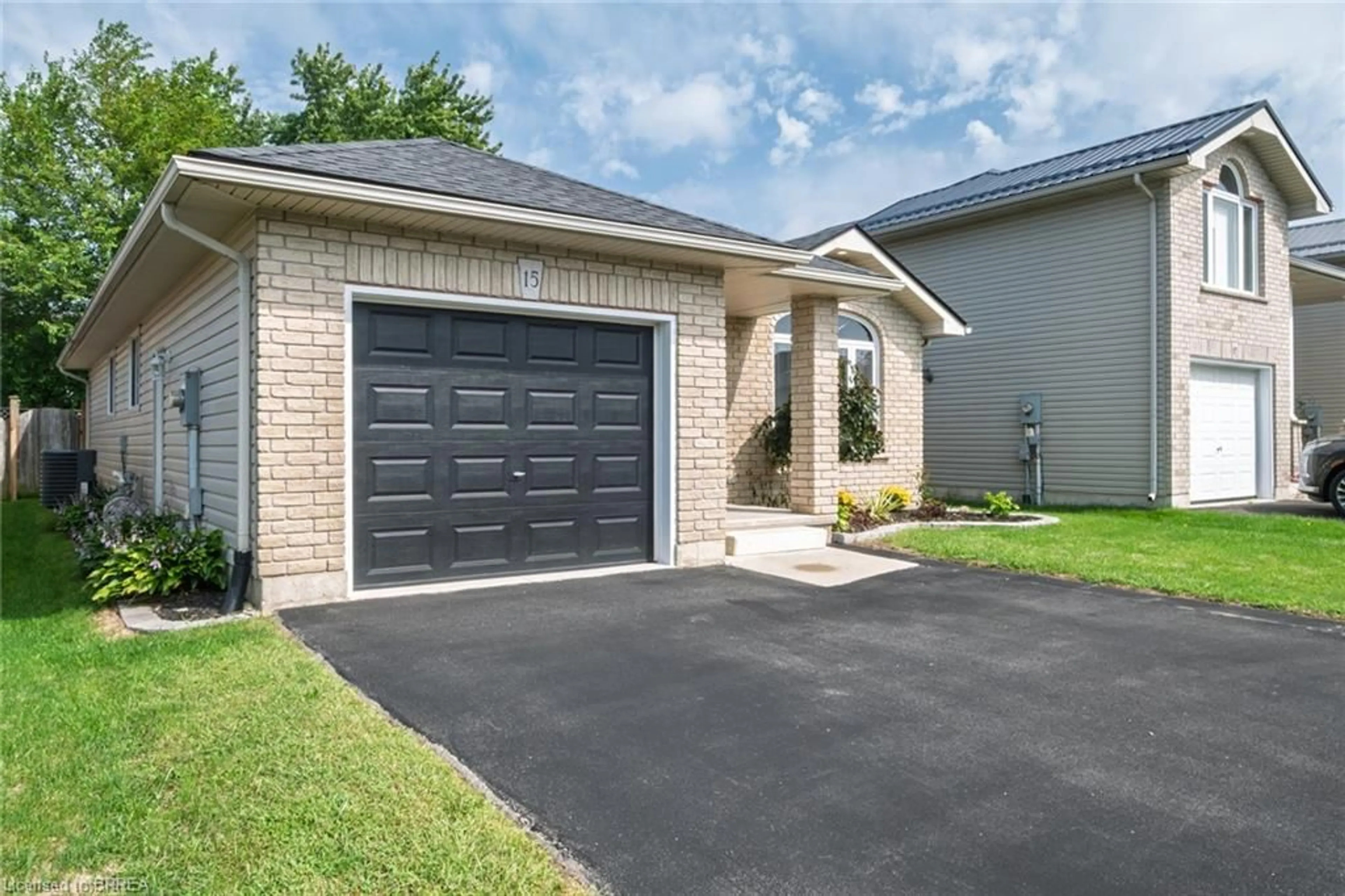 Home with brick exterior material, street for 15 Landon Ave, Simcoe Ontario N3Y 5J8