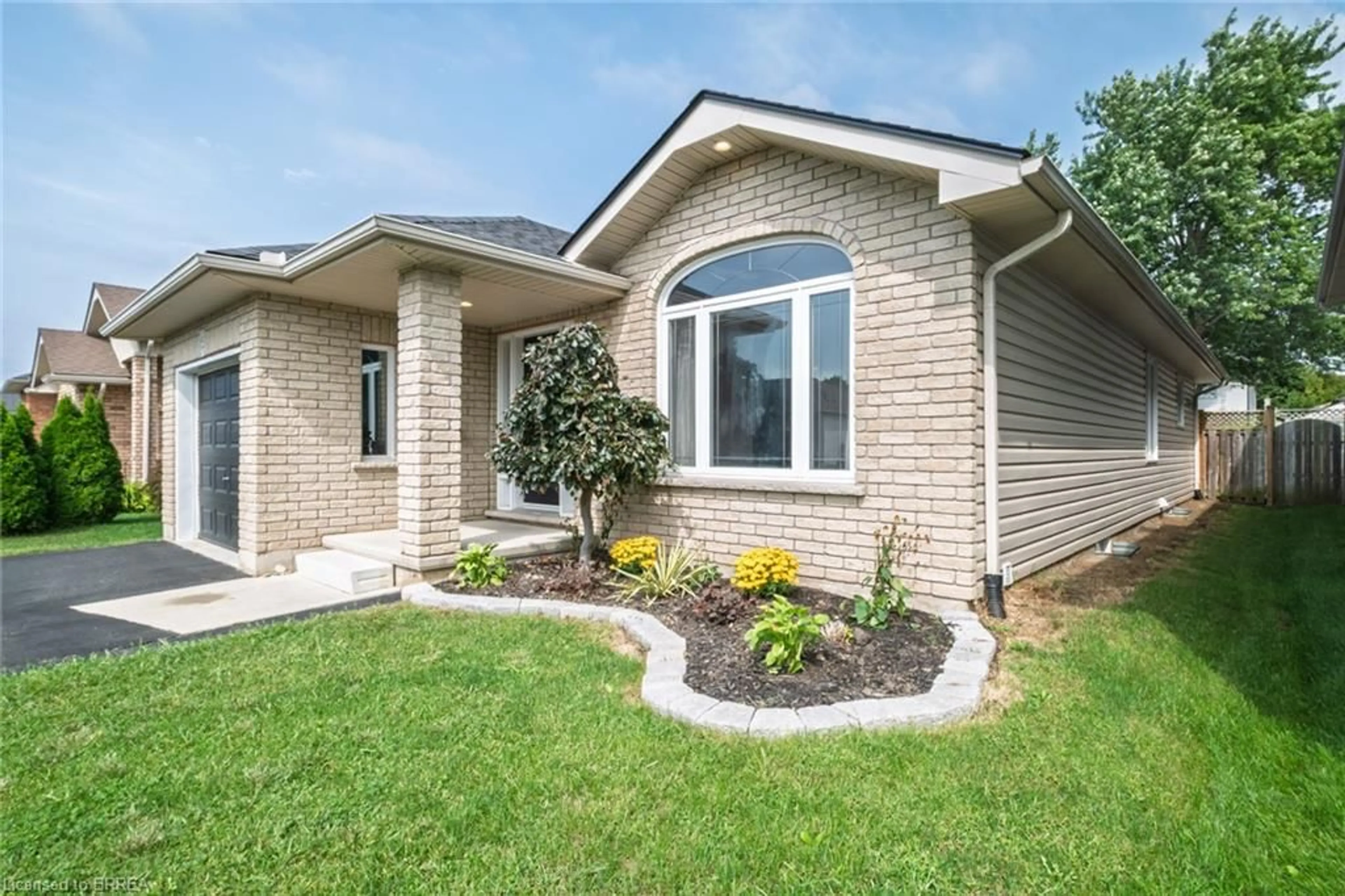 Home with brick exterior material, street for 15 Landon Ave, Simcoe Ontario N3Y 5J8