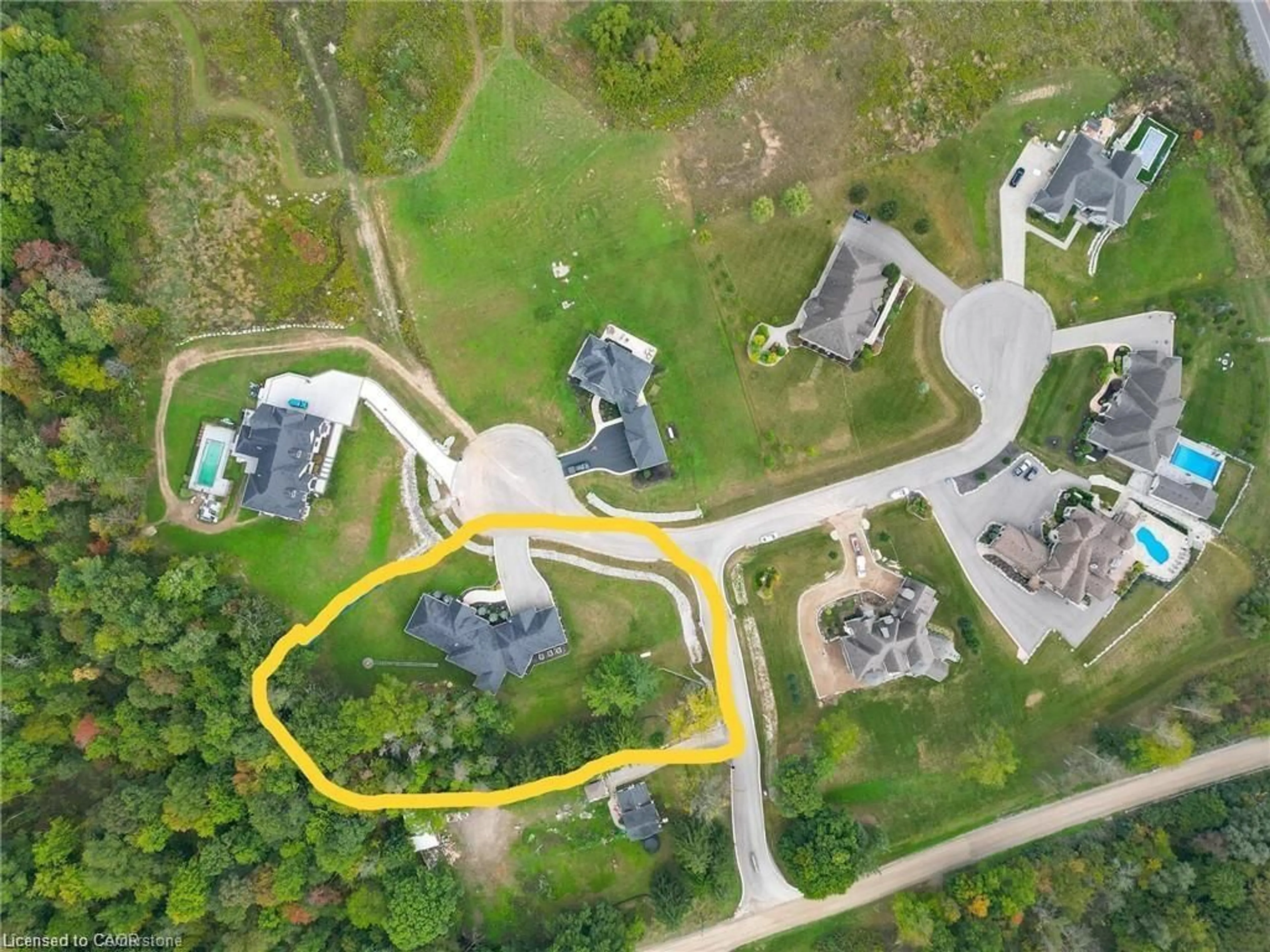 A pic from outside/outdoor area/front of a property/back of a property/a pic from drone, street for 325 Mclean School Rd #8, St. George Ontario N0E 1N0