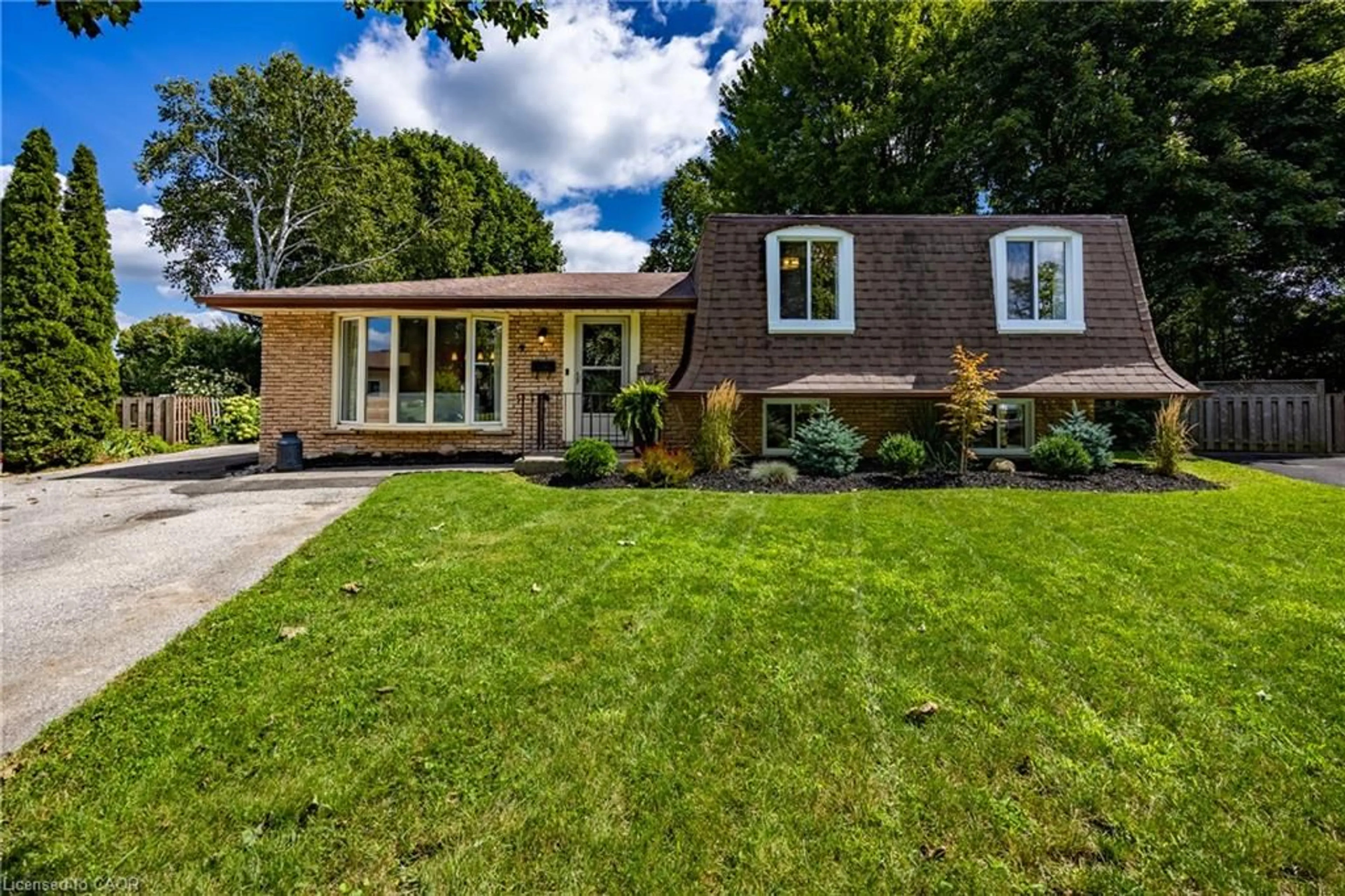 Home with brick exterior material, street for 9 Normandy Cir, Simcoe Ontario N3Y 4J6