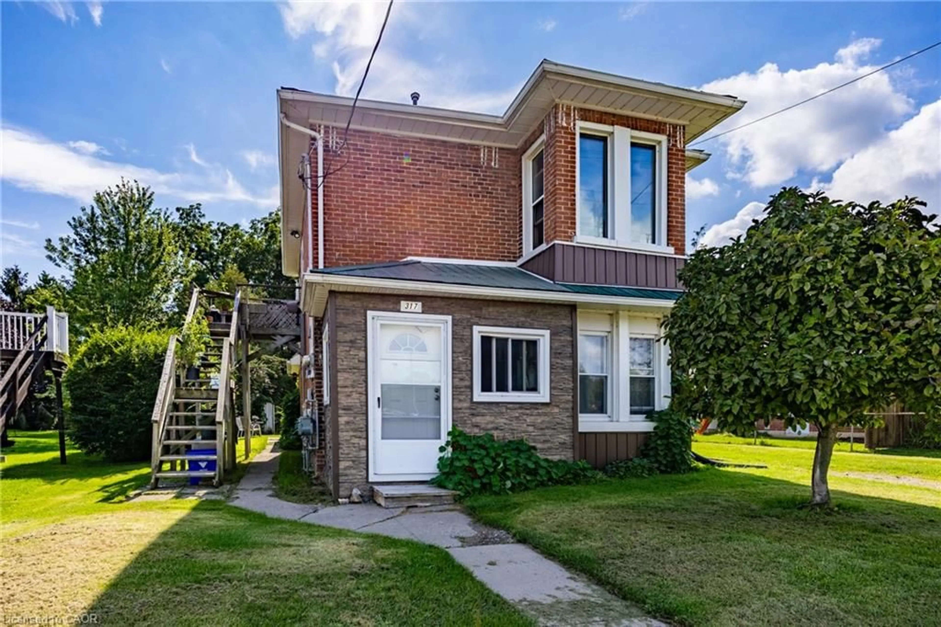 Home with brick exterior material, building for 317 St Patrick St, Port Dover Ontario N0A 1N0