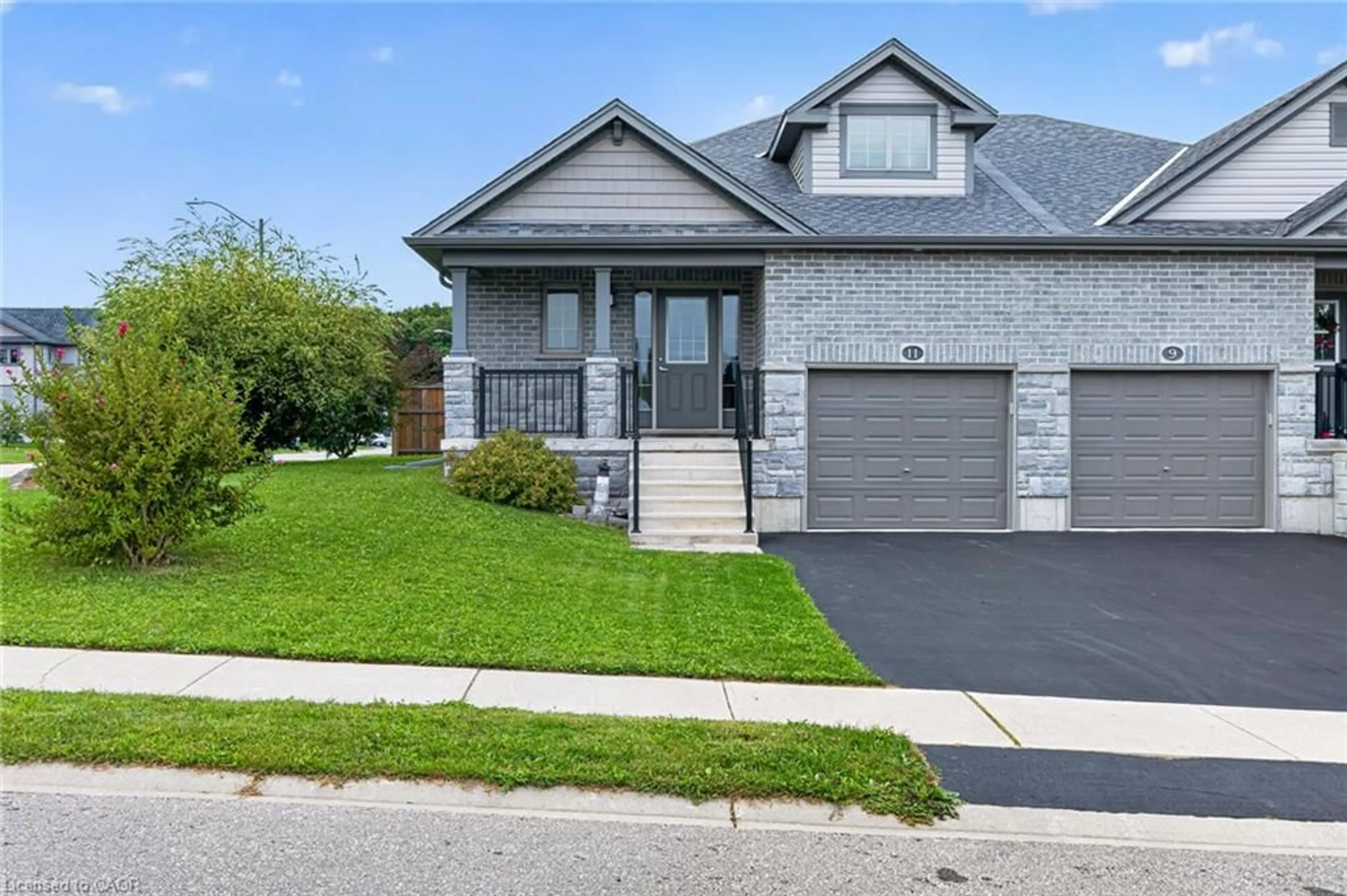 Home with brick exterior material, street for 11 Hackberry Lane, Simcoe Ontario N3Y 0E1