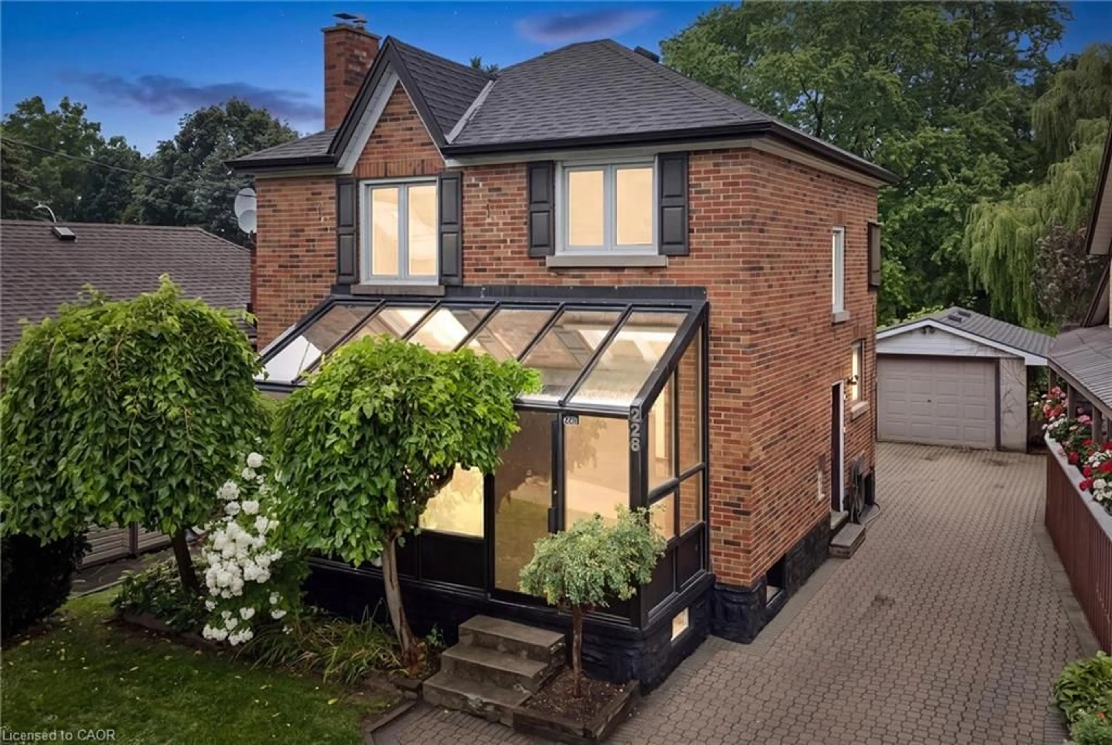 Home with brick exterior material, street for 228 Waterloo St, Kitchener Ontario N2H 3W1