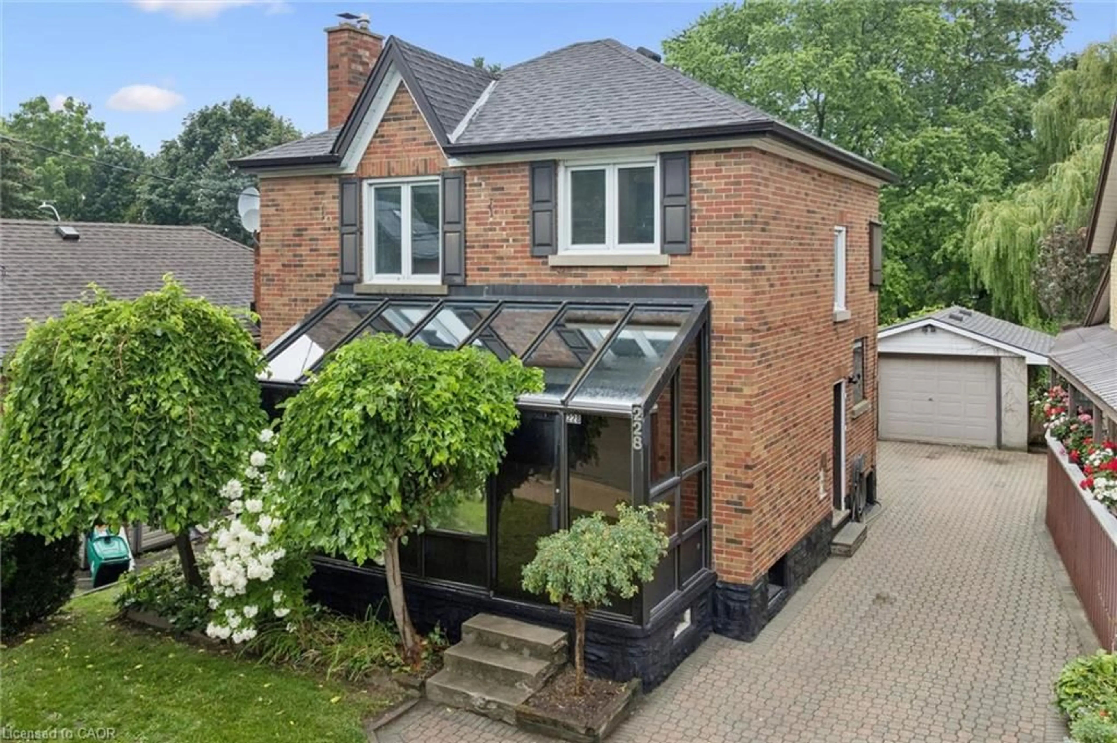 A pic from outside/outdoor area/front of a property/back of a property/a pic from drone, street for 228 Waterloo St, Kitchener Ontario N2H 3W1