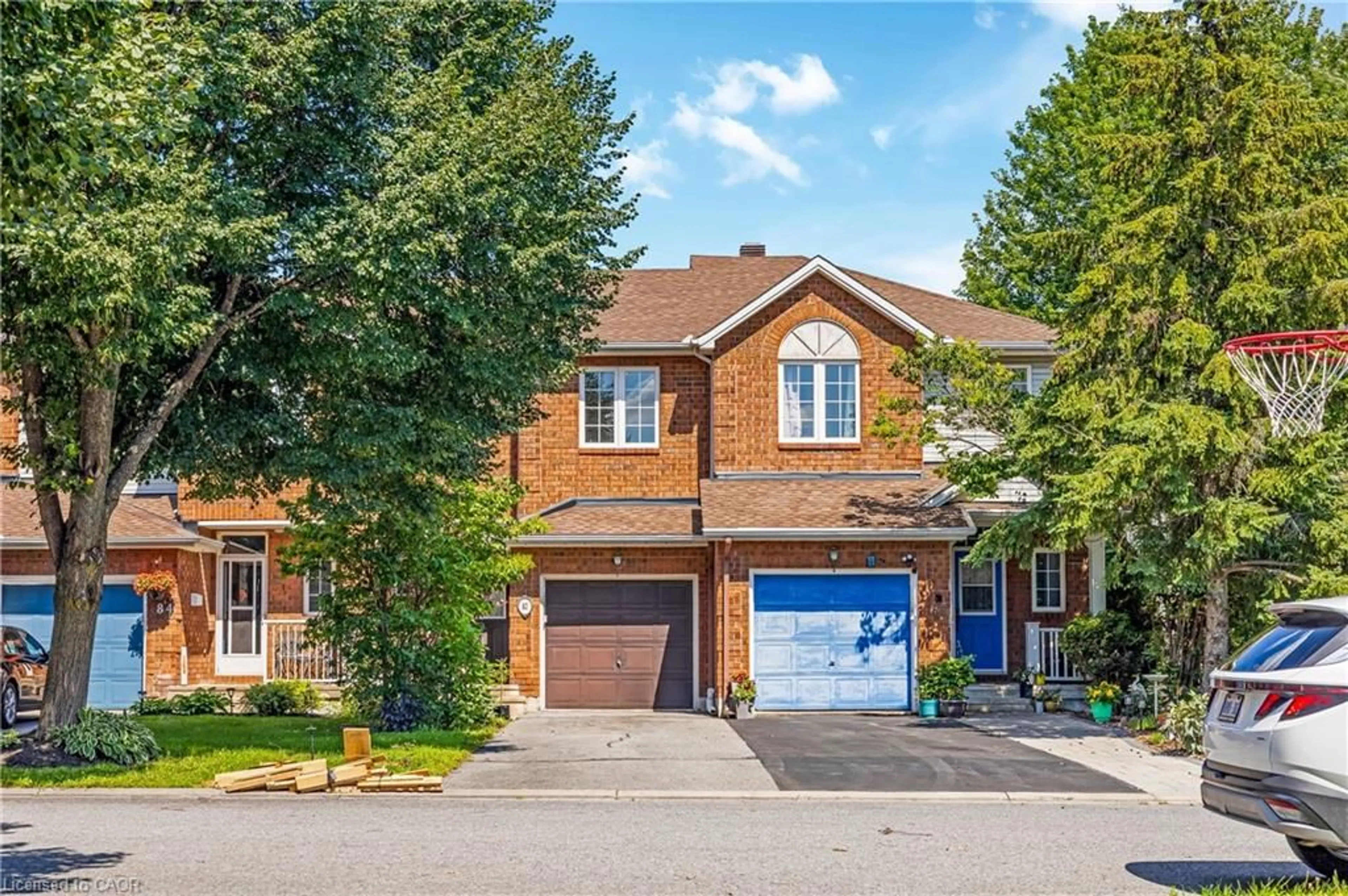 Home with brick exterior material, street for 82 Milner Downs Cres, Ottawa Ontario K2M 2S5