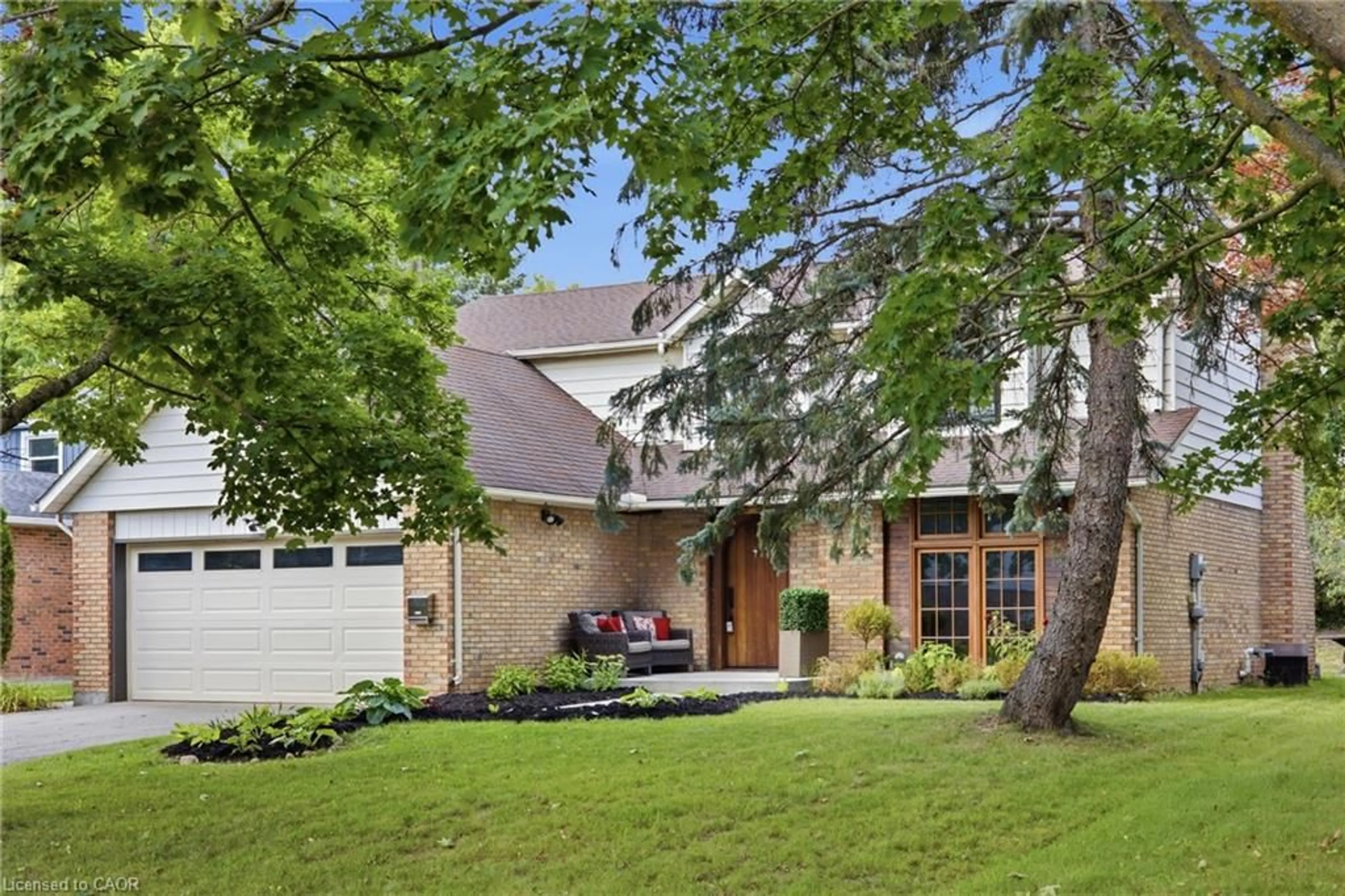 Home with brick exterior material, street for 416 Clairbrook Cres, Waterloo Ontario N2L 5V7