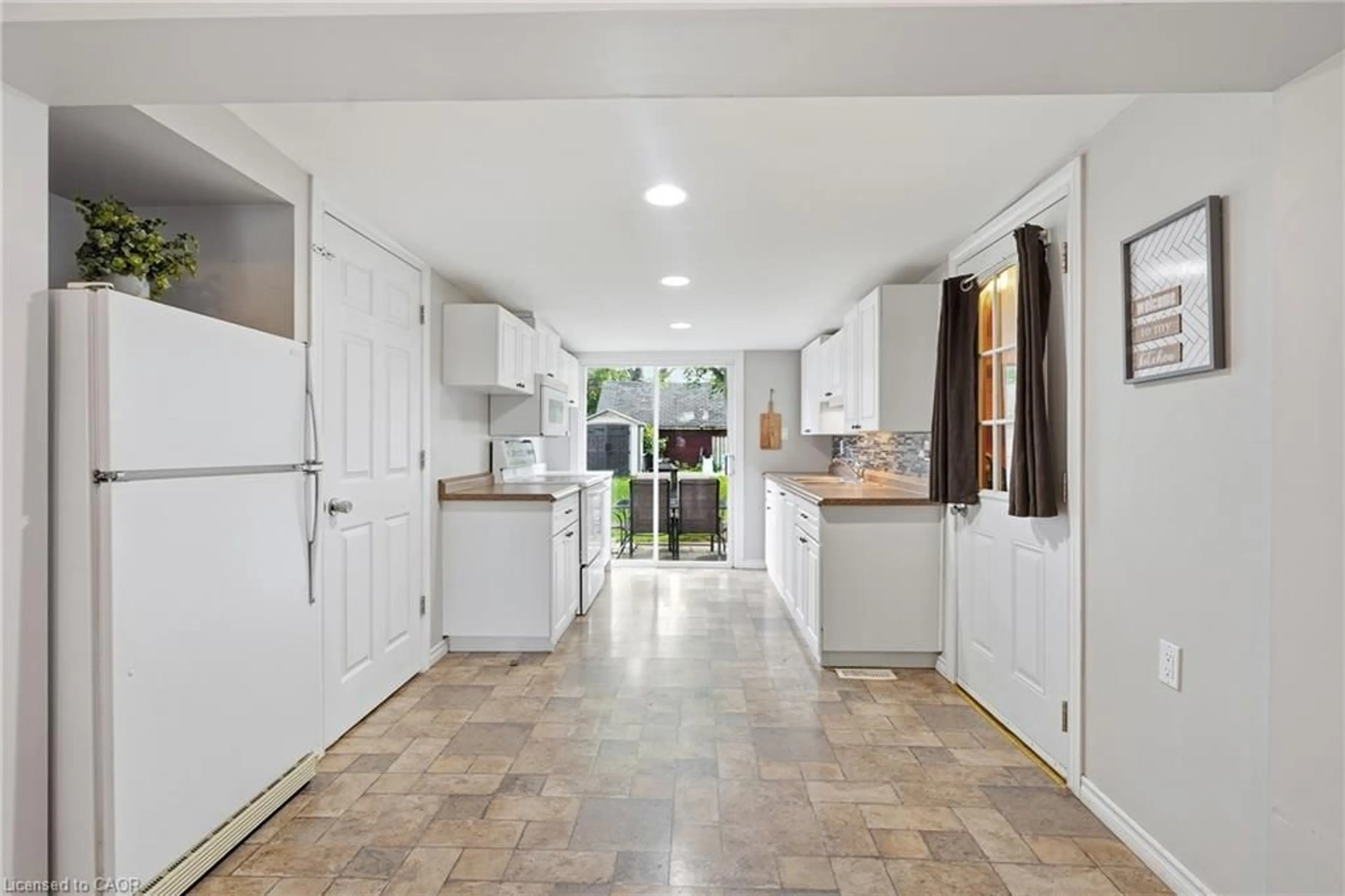 Open concept kitchen, ceramic/tile floor for 442 Burdick Pl, London Ontario N5W 4P6