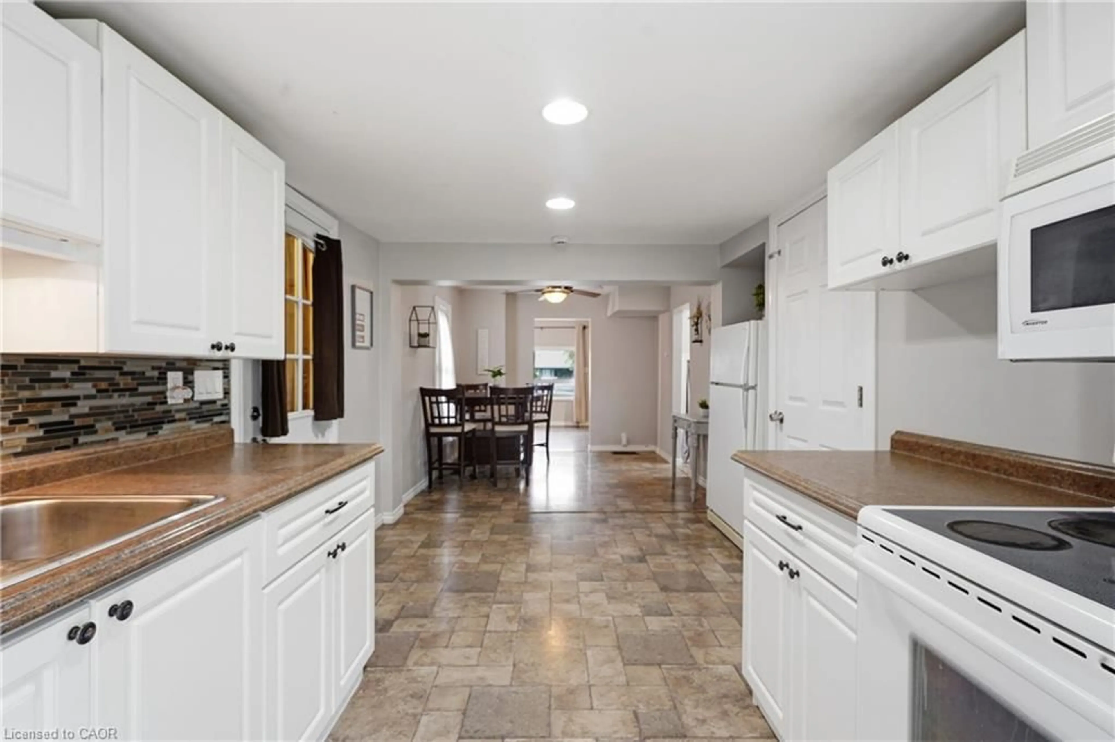 Open concept kitchen, ceramic/tile floor for 442 Burdick Pl, London Ontario N5W 4P6