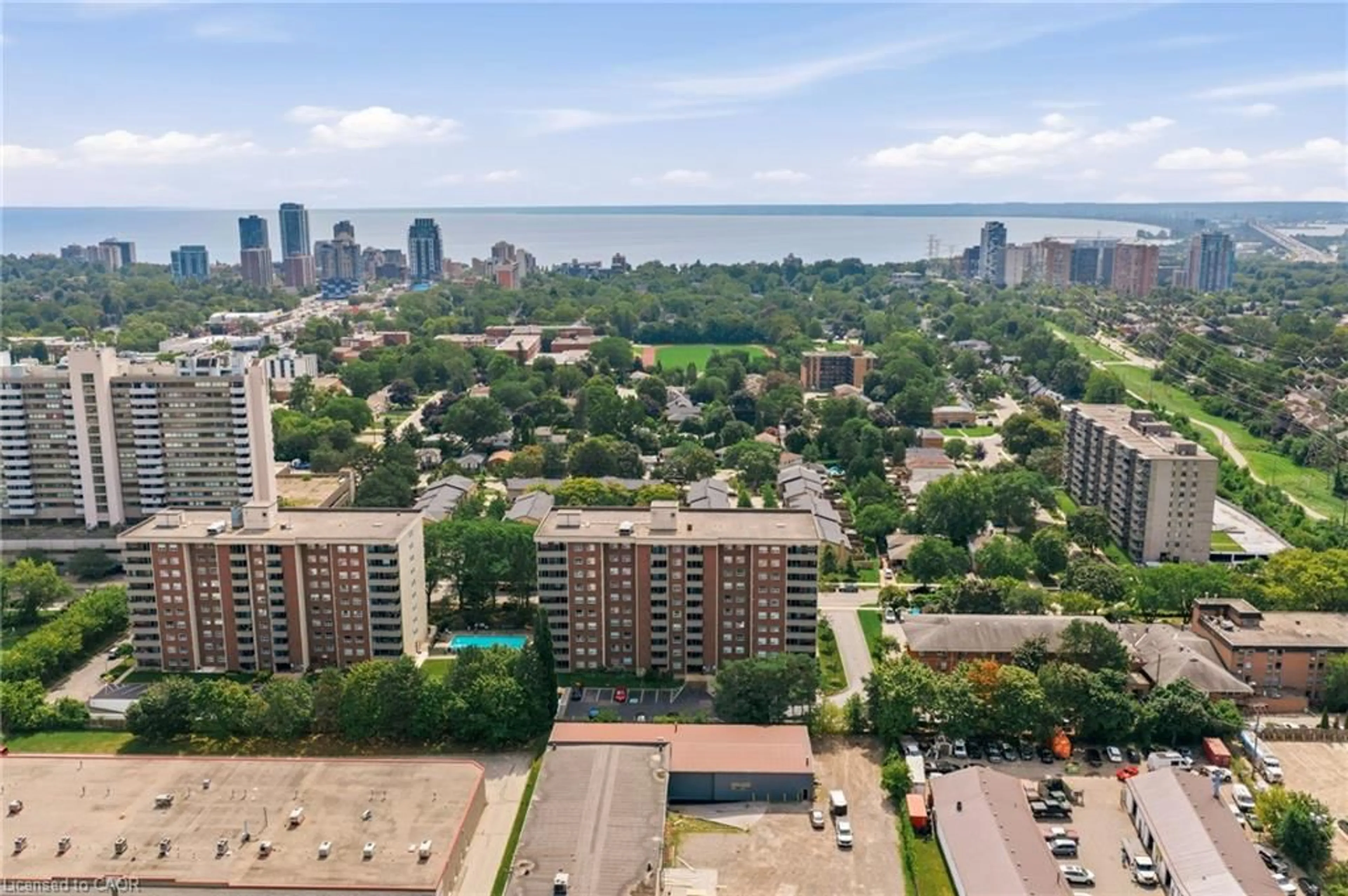 A pic from outside/outdoor area/front of a property/back of a property/a pic from drone, city buildings view from balcony for 1415 Ghent Ave #203, Burlington Ontario L7S 1X4