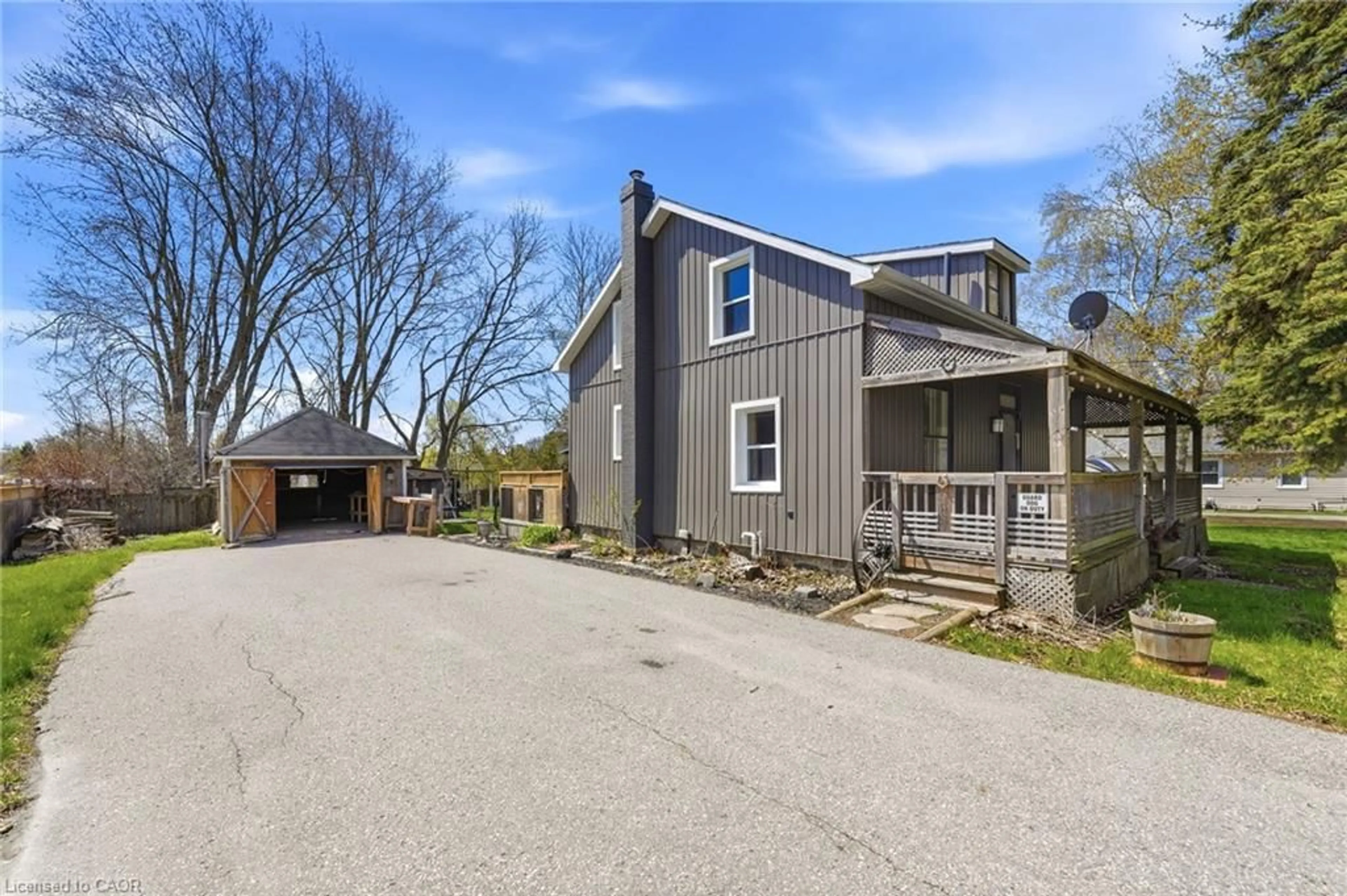 A pic from outside/outdoor area/front of a property/back of a property/a pic from drone, street for 10755 County Rd 2, Grafton Ontario K0K 2G0