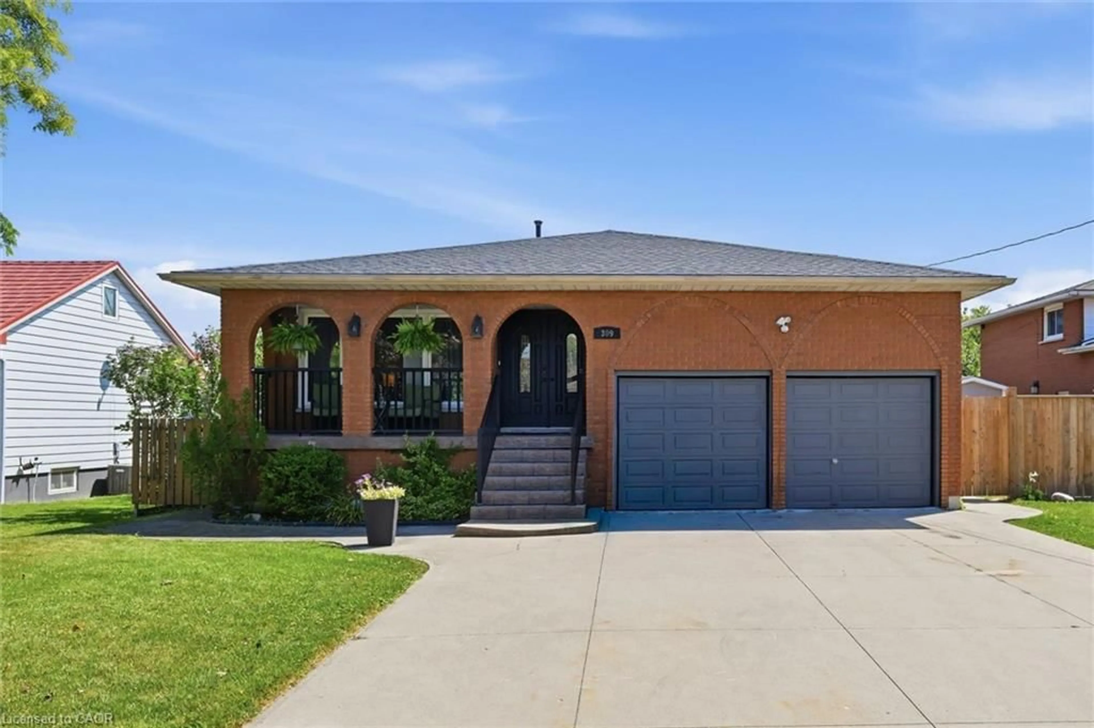 Home with brick exterior material, street for 309 Hawkridge Ave, Hamilton Ontario L9C 3L1