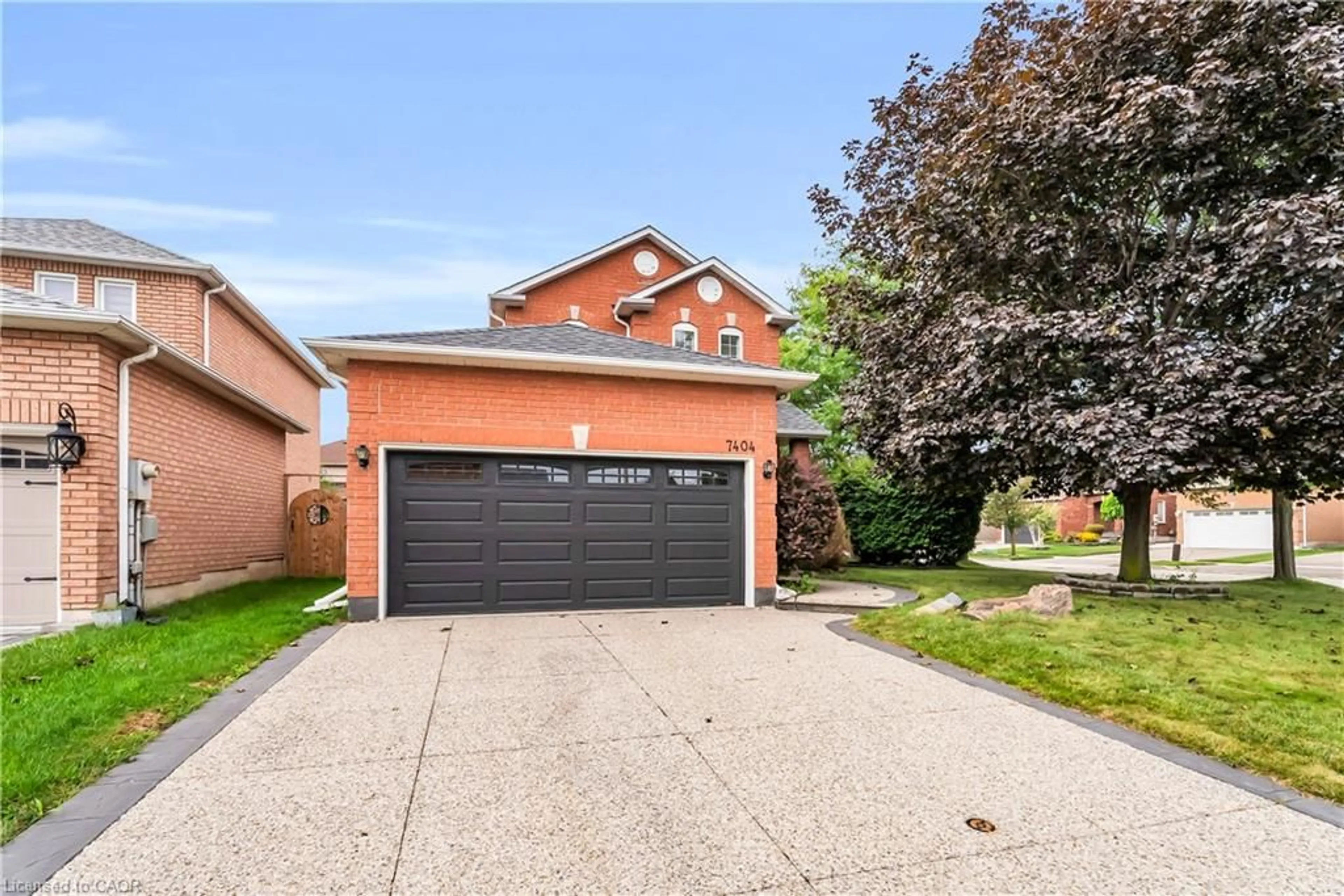 Home with brick exterior material, street for 7404 Davemark Crt, 10th Line Shore Ontario L5N 7P3
