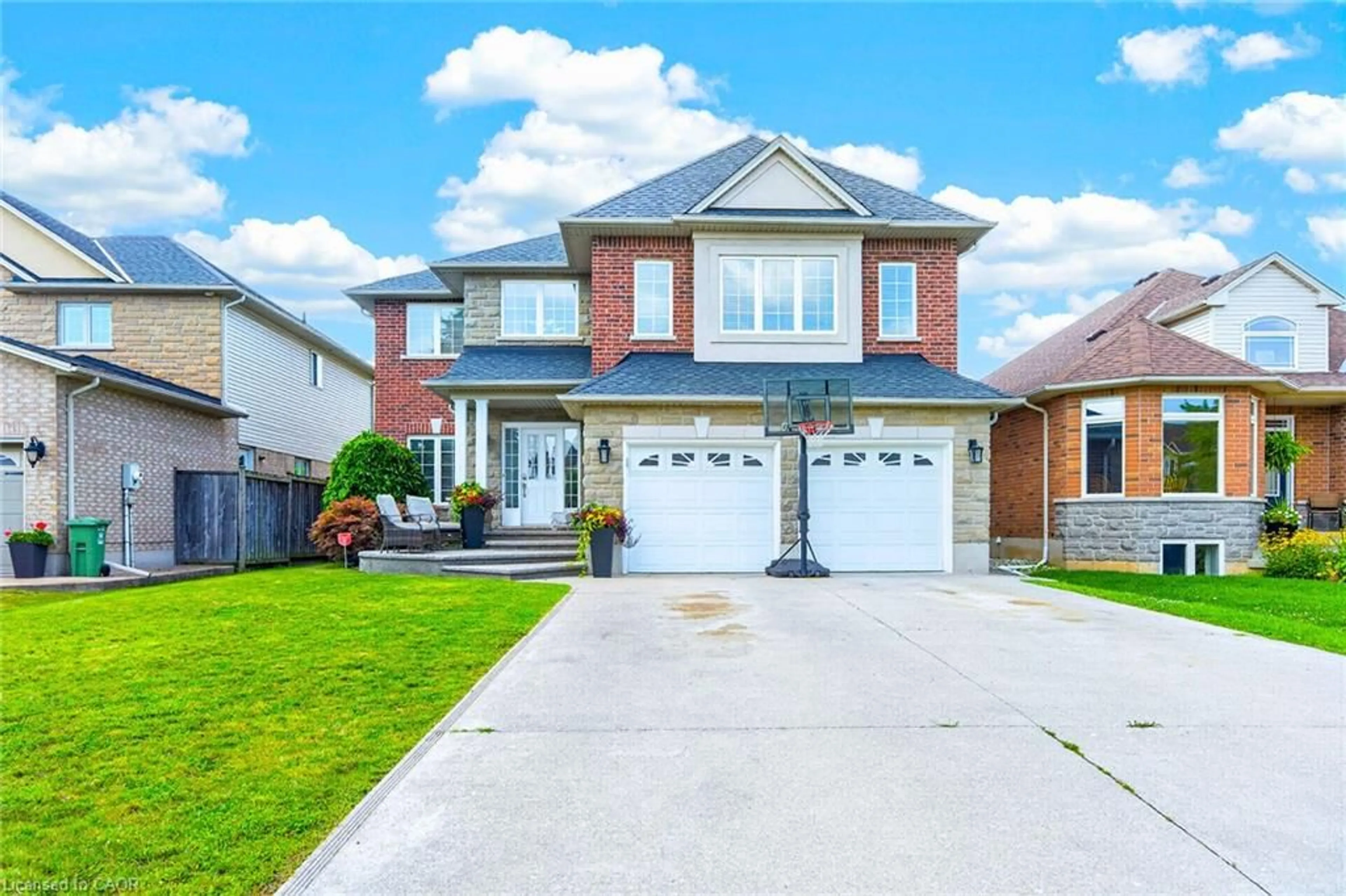 Home with brick exterior material, street for 27 Garth Trails Cres, Hamilton Ontario L9B 2X1