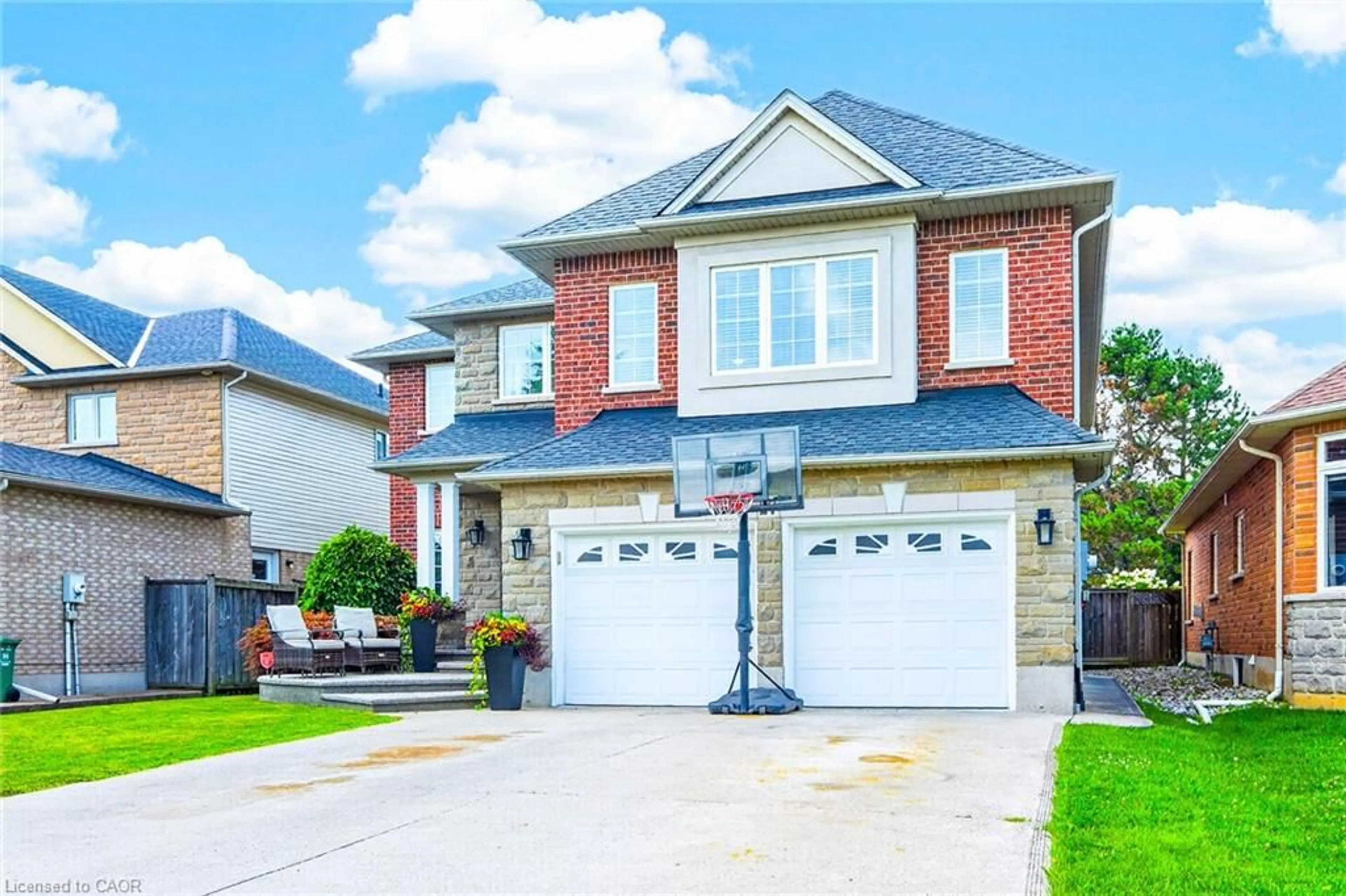 Home with brick exterior material, street for 27 Garth Trails Cres, Hamilton Ontario L9B 2X1