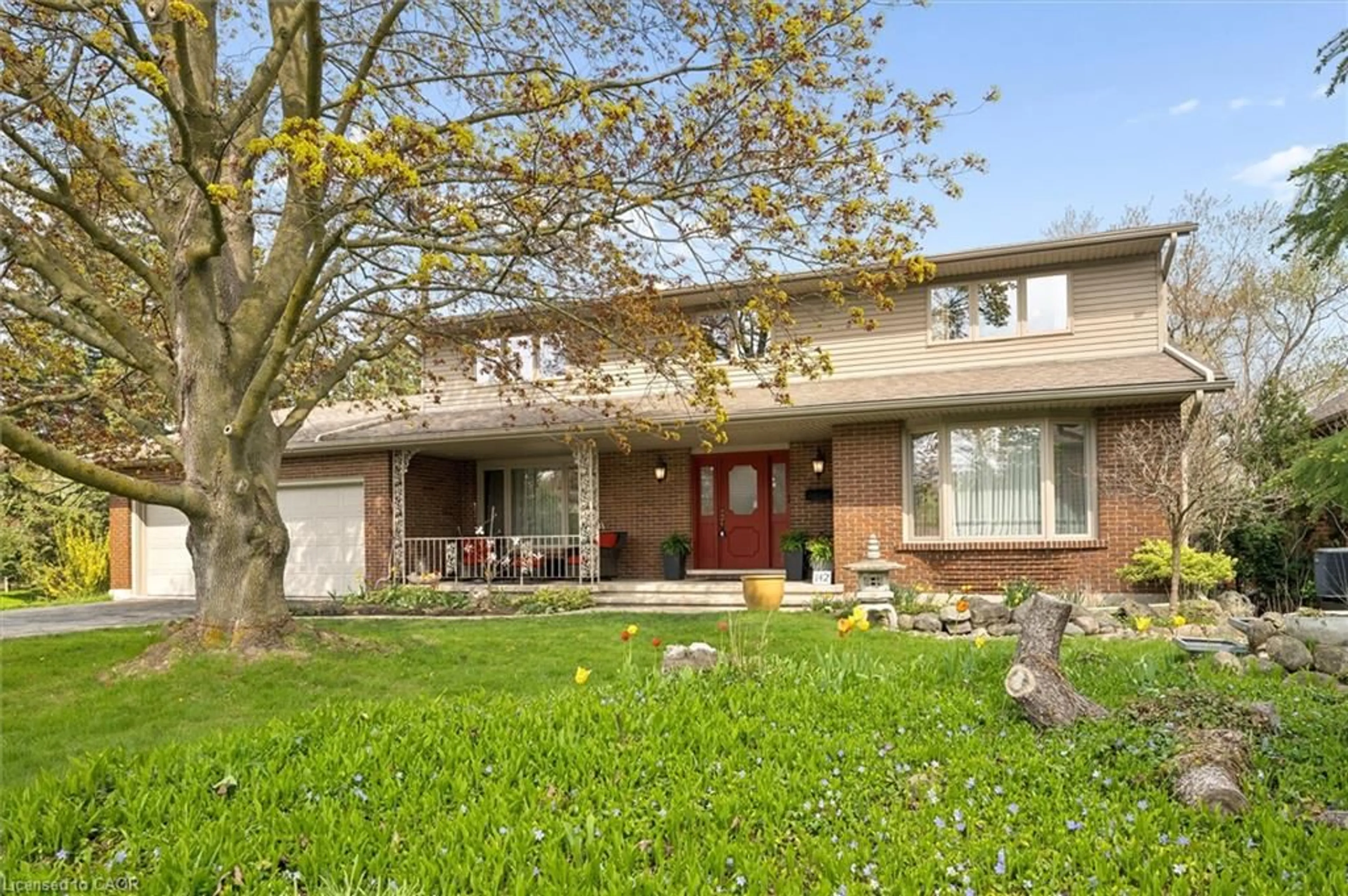 Home with brick exterior material, street for 142 Carson Dr, Kitchener Ontario N2B 2Z2