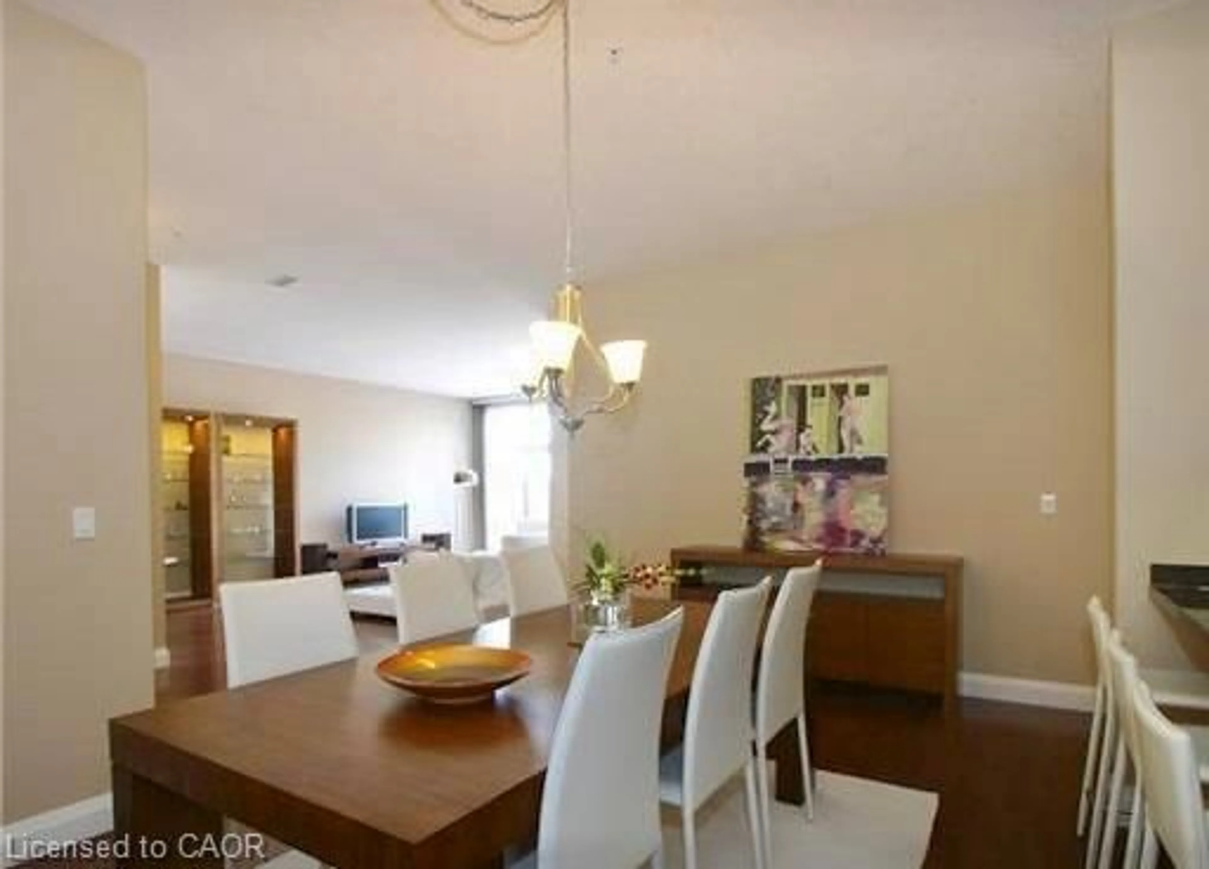 Dining room, wood/laminate floor for 165 Duke St #309, Kitchener Ontario N2H 6T8