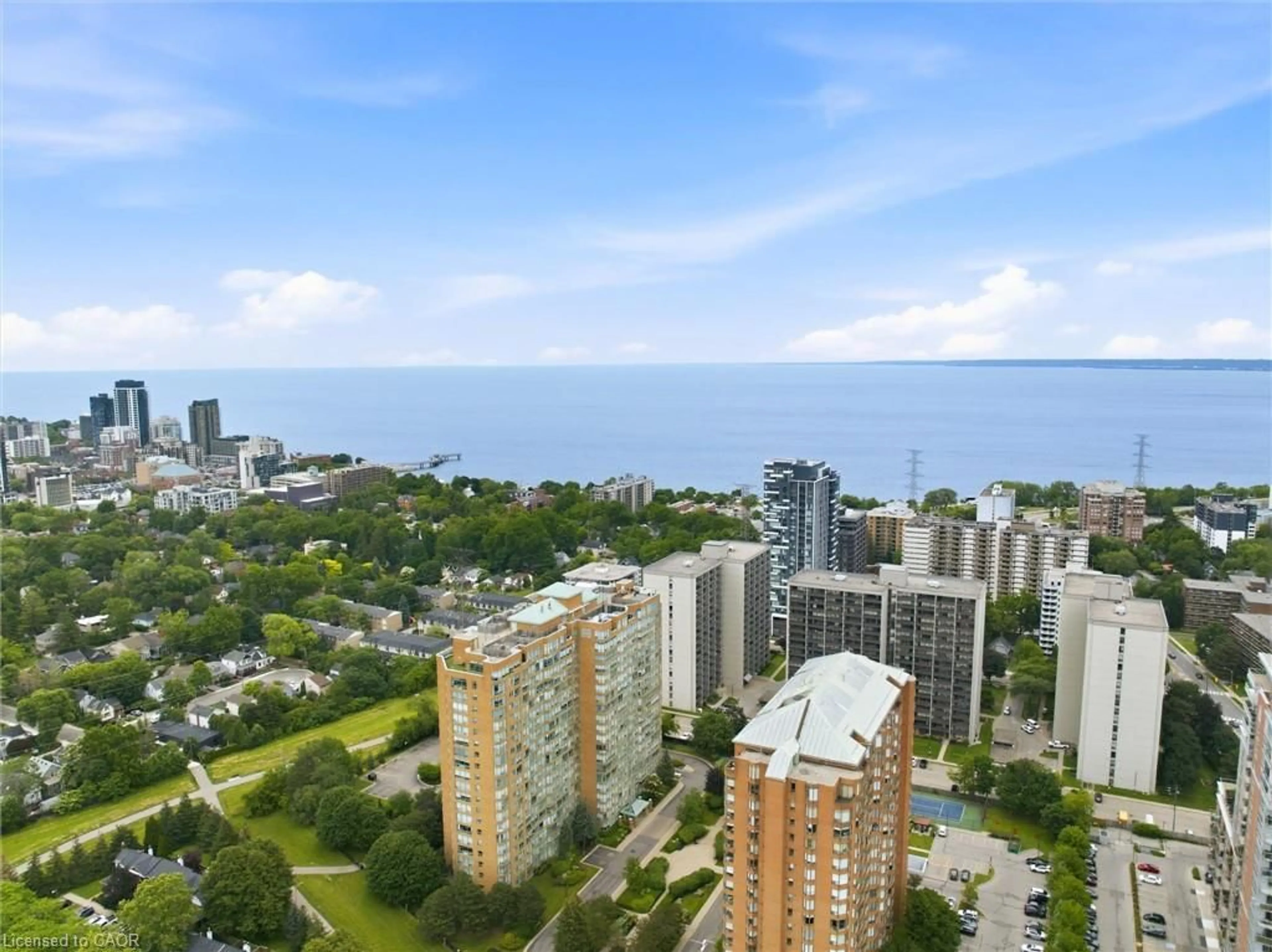 A pic from outside/outdoor area/front of a property/back of a property/a pic from drone, city buildings view from balcony for 1276 Maple Crossing Blvd #110, Burlington Ontario L7S 2J9