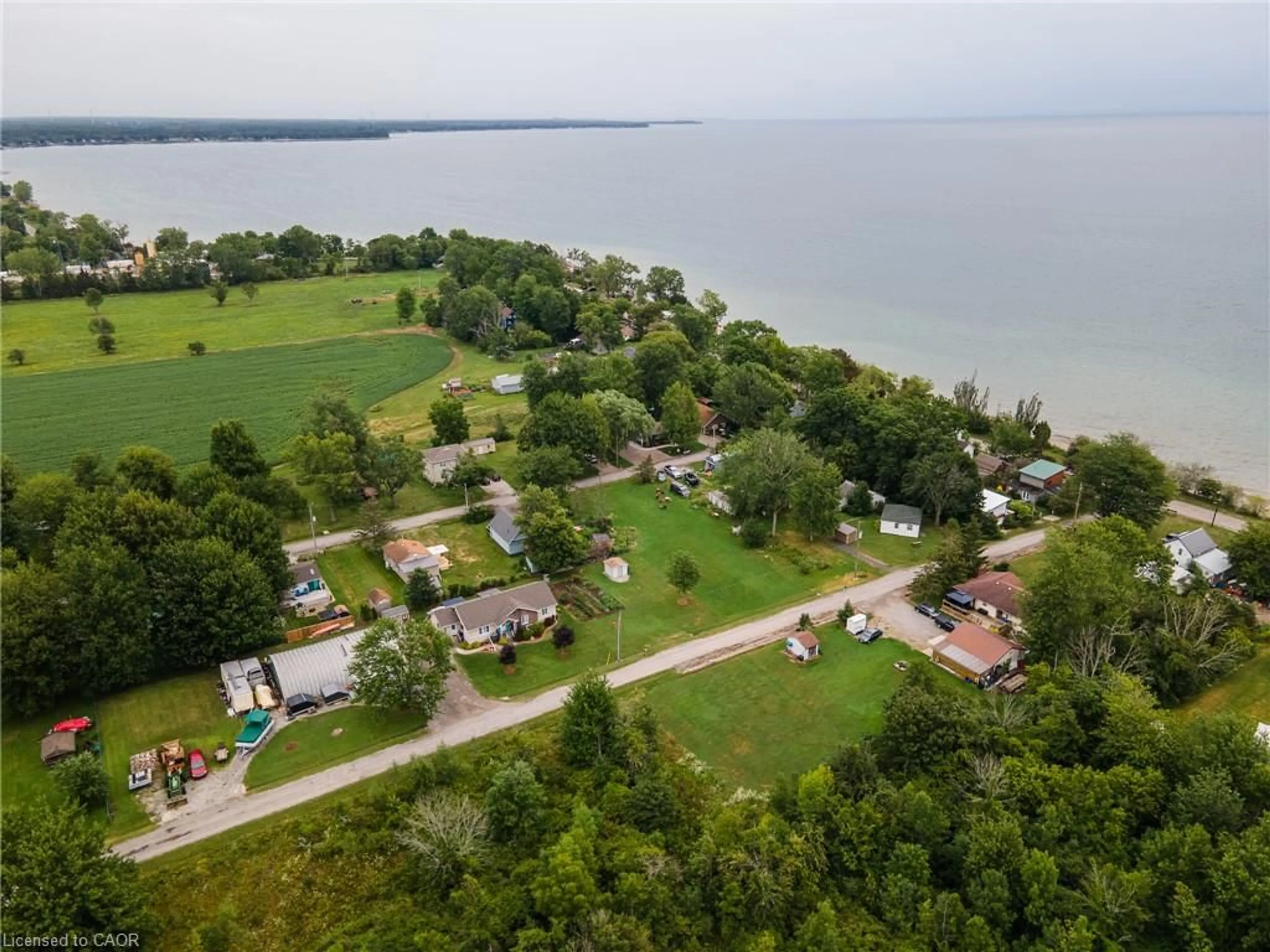 A pic from outside/outdoor area/front of a property/back of a property/a pic from drone, water/lake/river/ocean view for 12 Canada Rd, Dunnville Ontario N0A 1K0