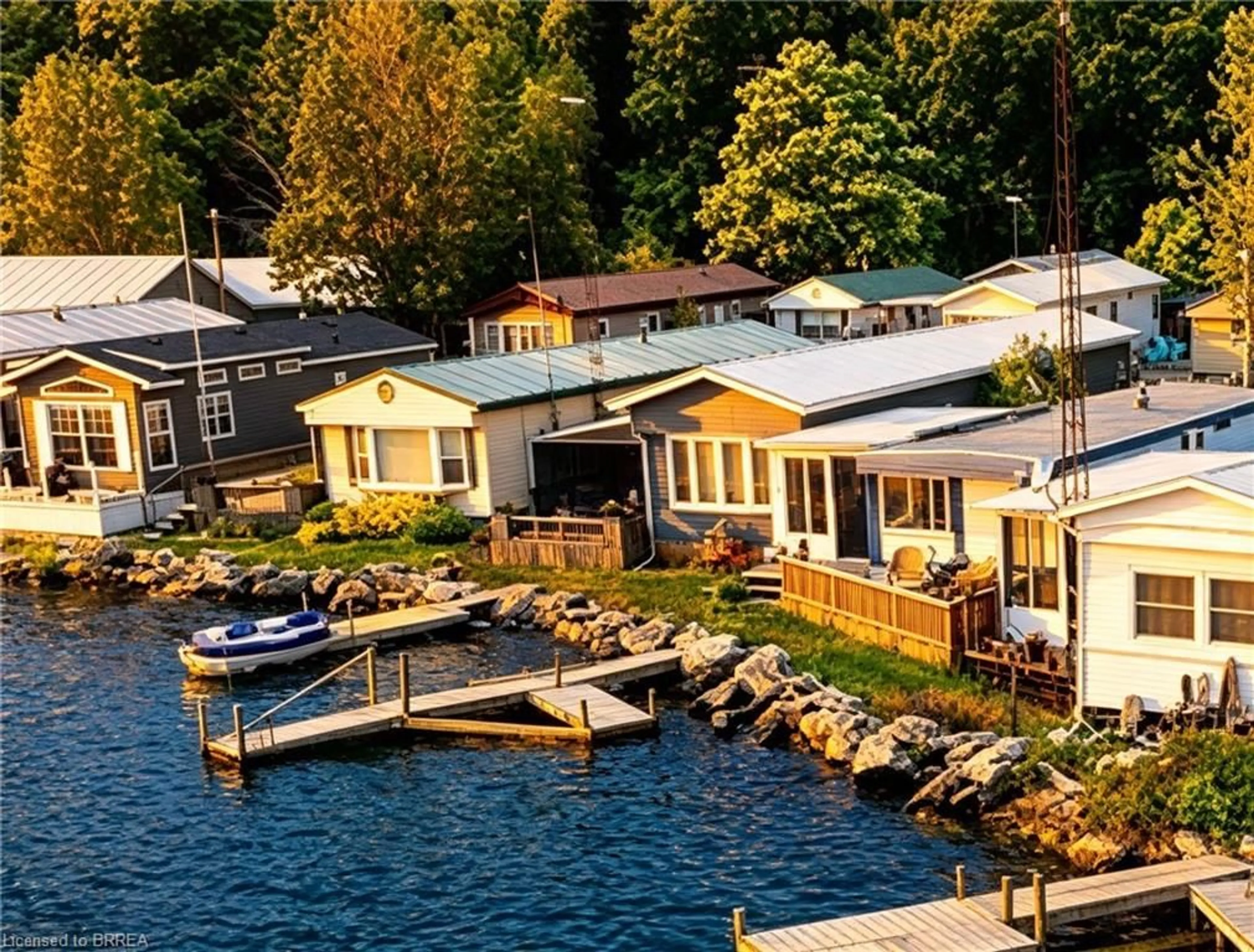 A pic from outside/outdoor area/front of a property/back of a property/a pic from drone, water/lake/river/ocean view for 70 Bluewater Ave #72, St. Williams Ontario N0E 1P0
