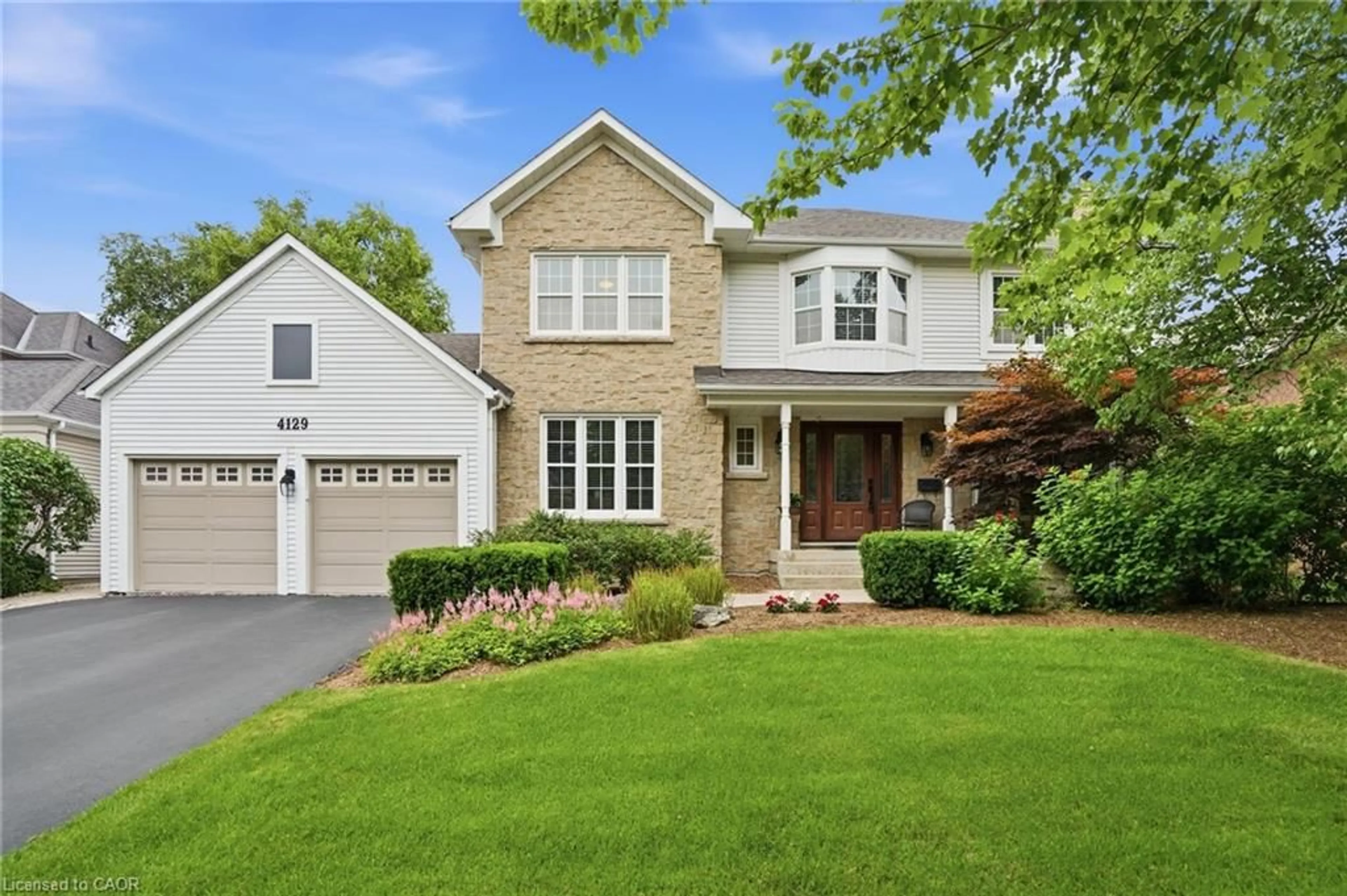 Home with brick exterior material, street for 4129 Millcroft Park Dr, Burlington Ontario L7M 3V1