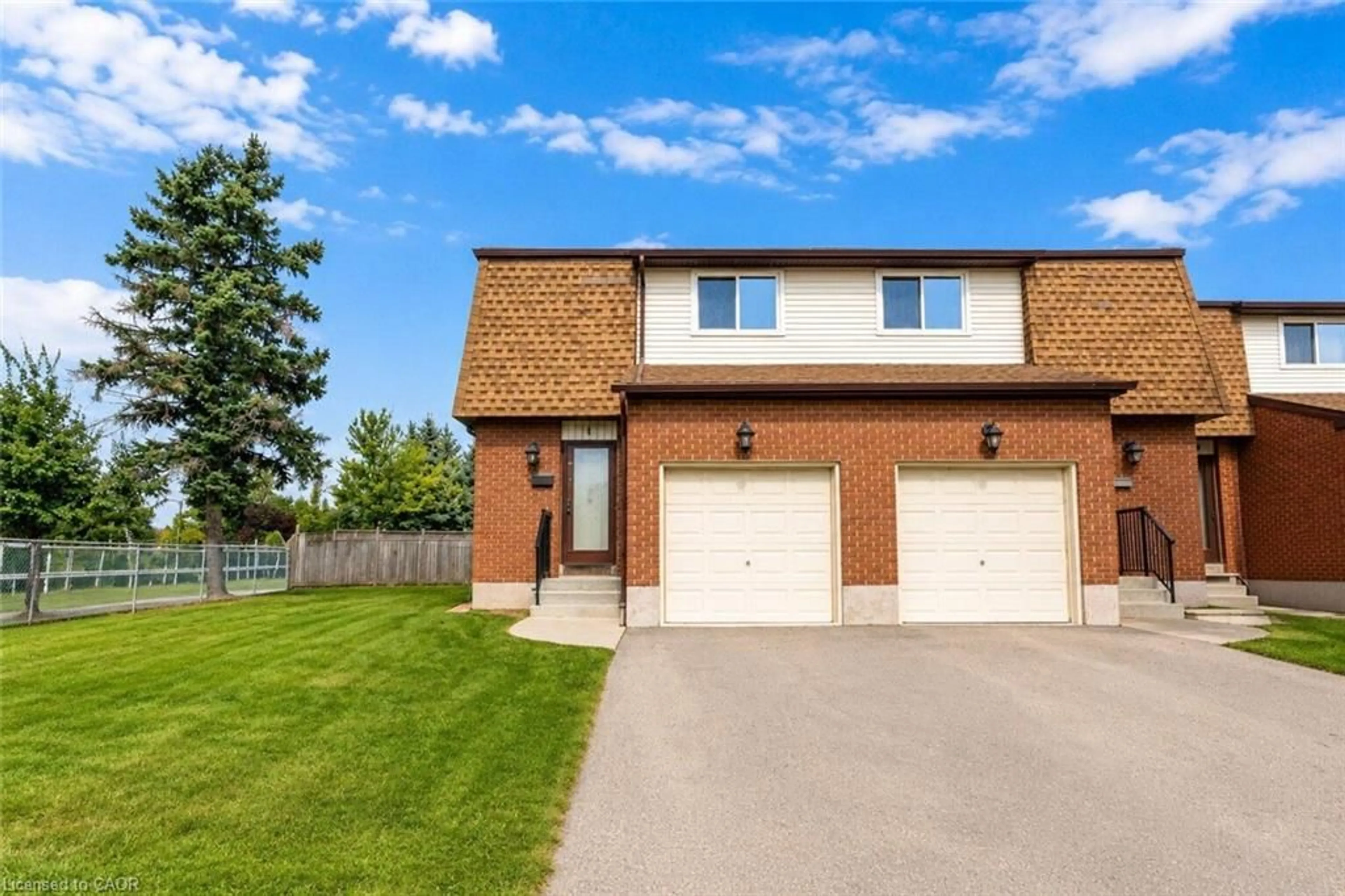 Home with brick exterior material, street for 899 Stone Church Rd #1, Hamilton Ontario L8W 1B2