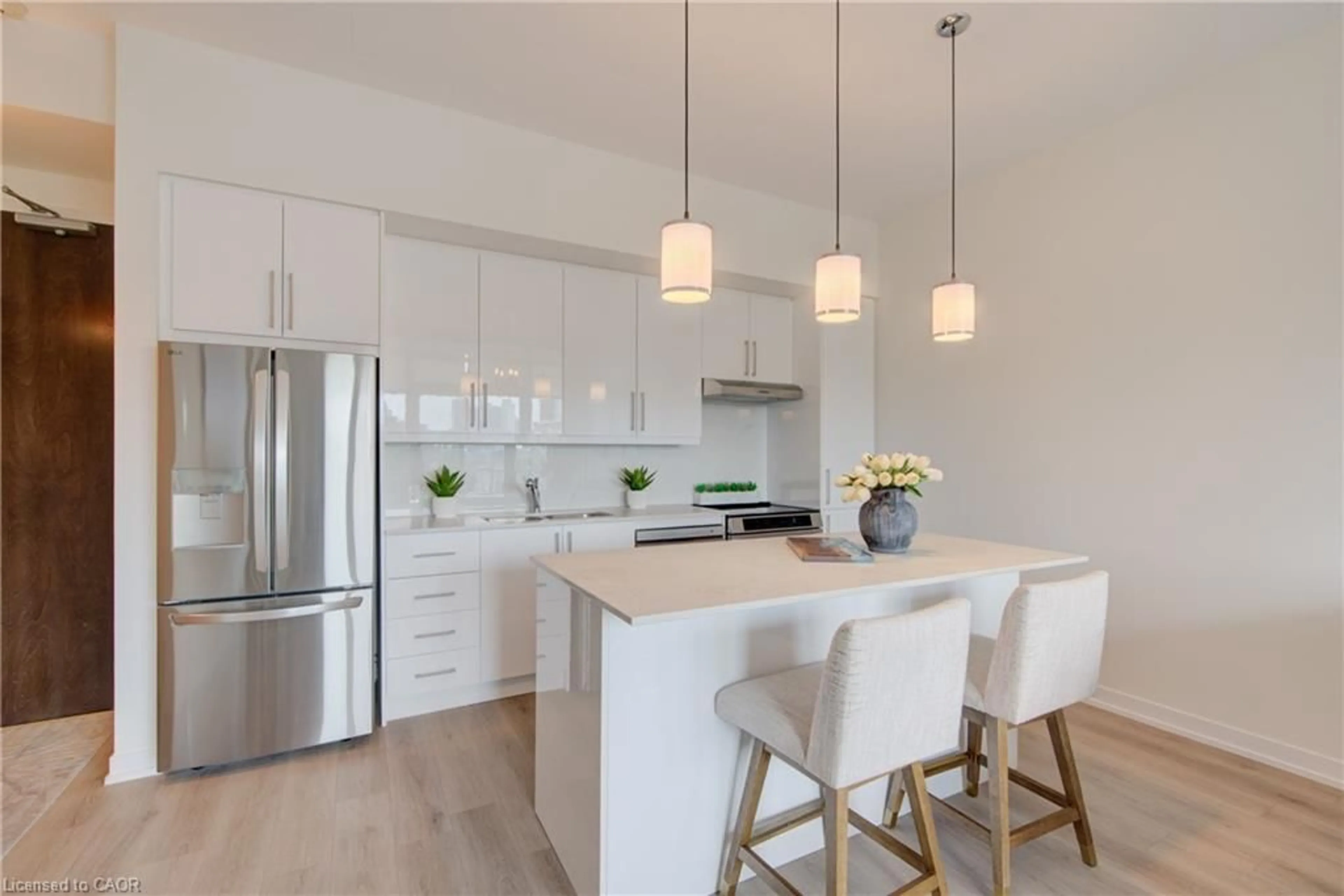 Open concept kitchen, wood/laminate floor for 191 King St #607, Waterloo Ontario N2J 1R1