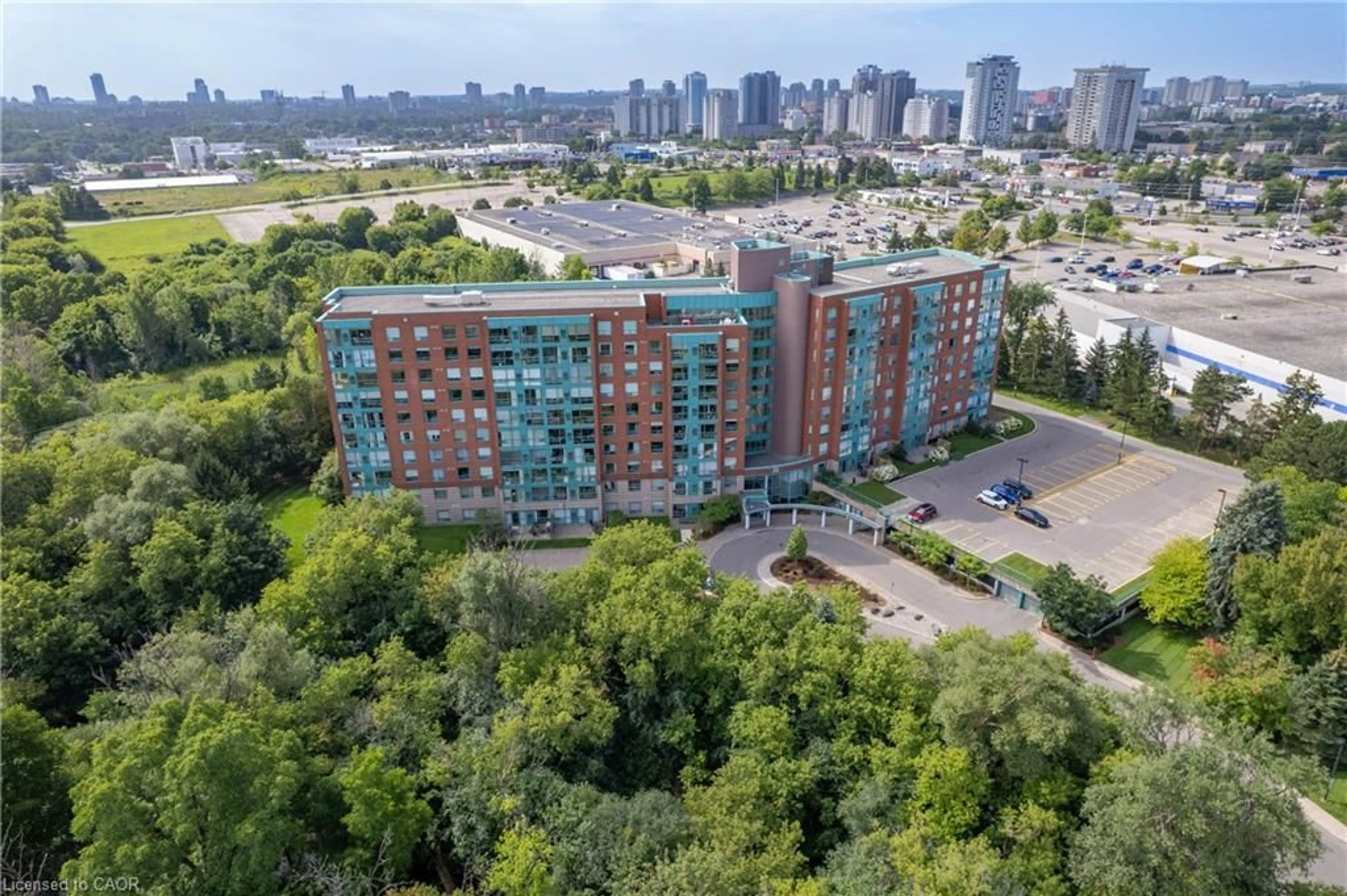 A pic from outside/outdoor area/front of a property/back of a property/a pic from drone, city buildings view from balcony for 55 Blue Springs Dr #611, Waterloo Ontario N2J 4T3