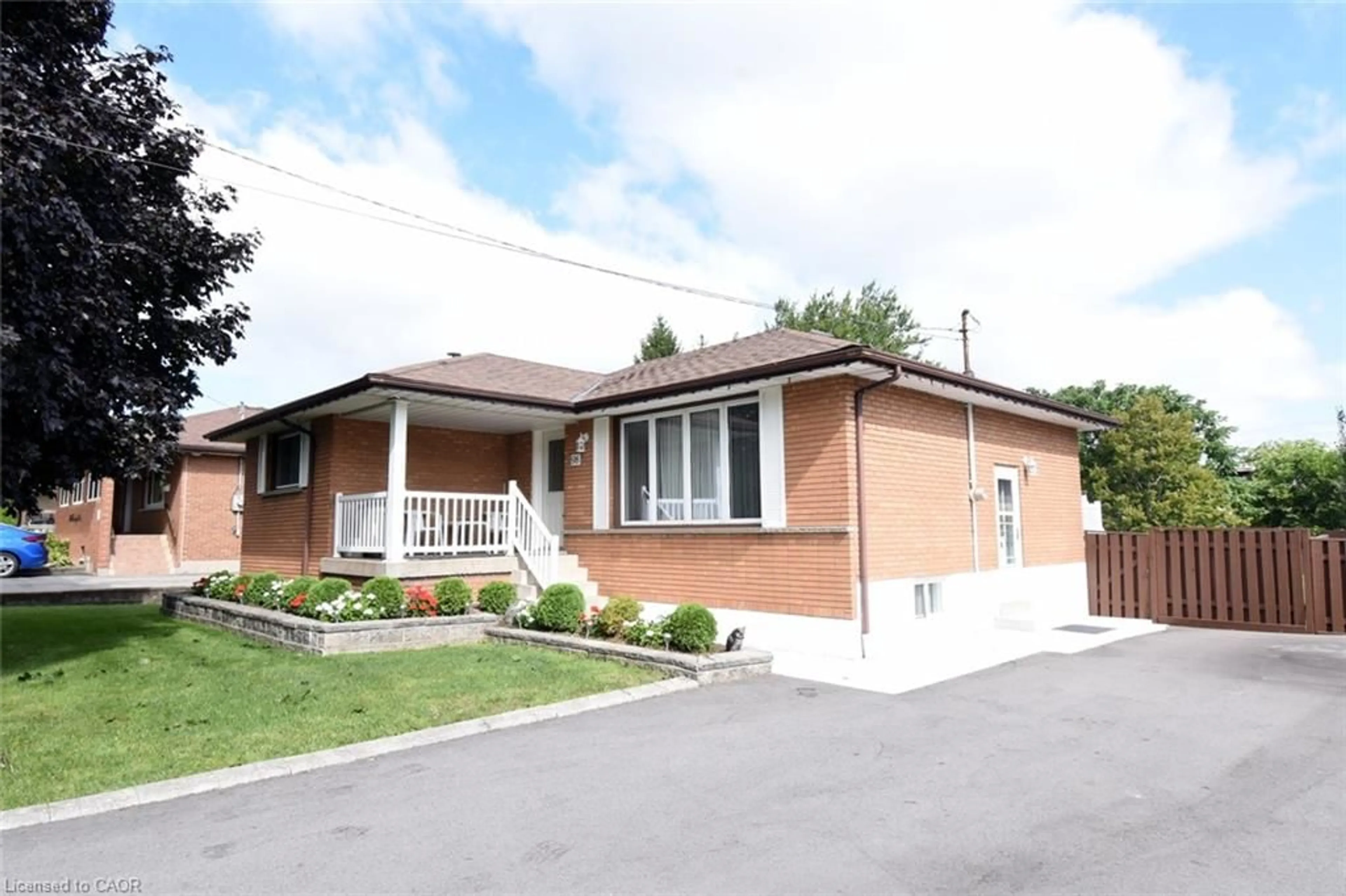 Home with brick exterior material, street for 98 Kennedy Ave, Hamilton Ontario L9B 1C7