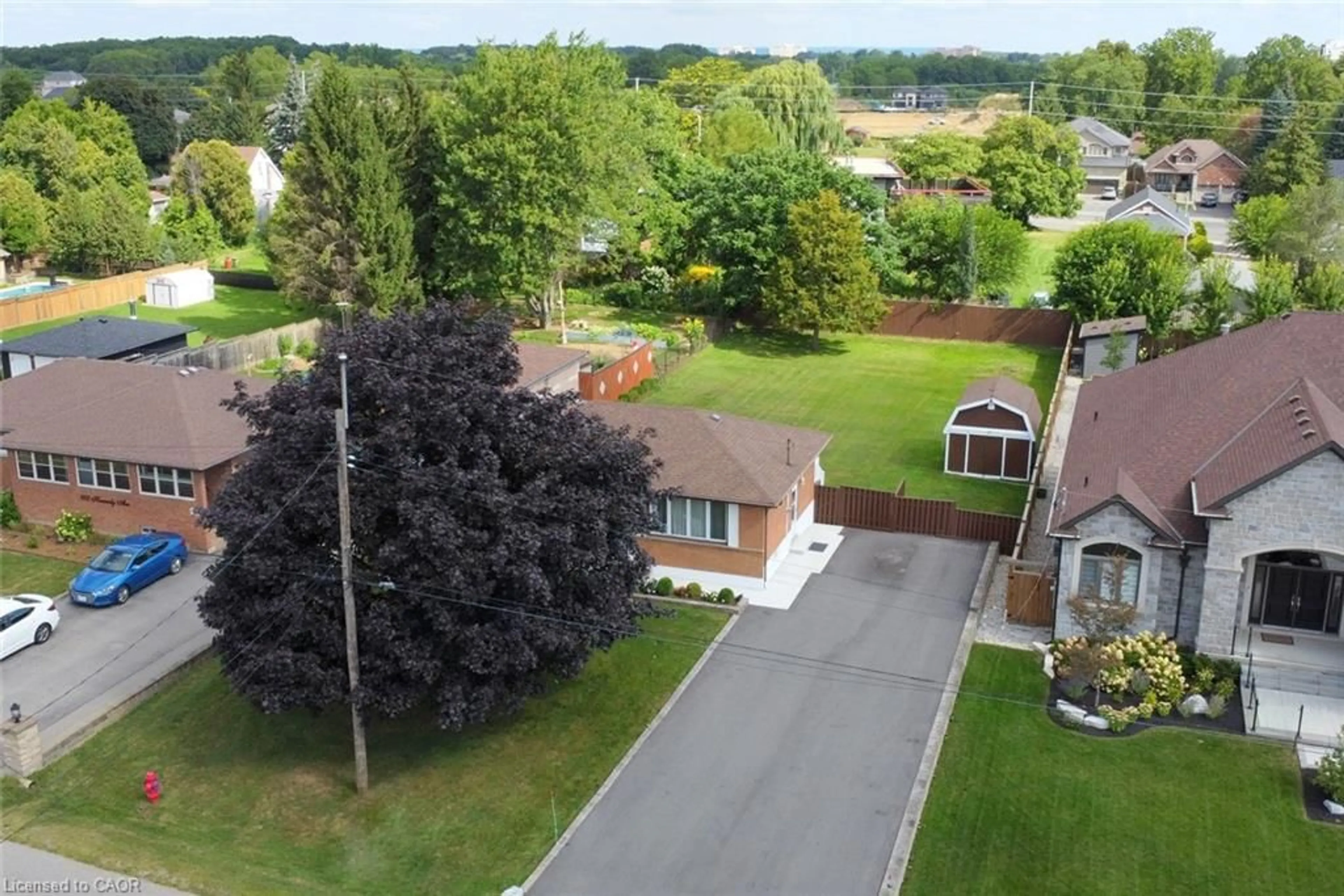 A pic from outside/outdoor area/front of a property/back of a property/a pic from drone, street for 98 Kennedy Ave, Hamilton Ontario L9B 1C7