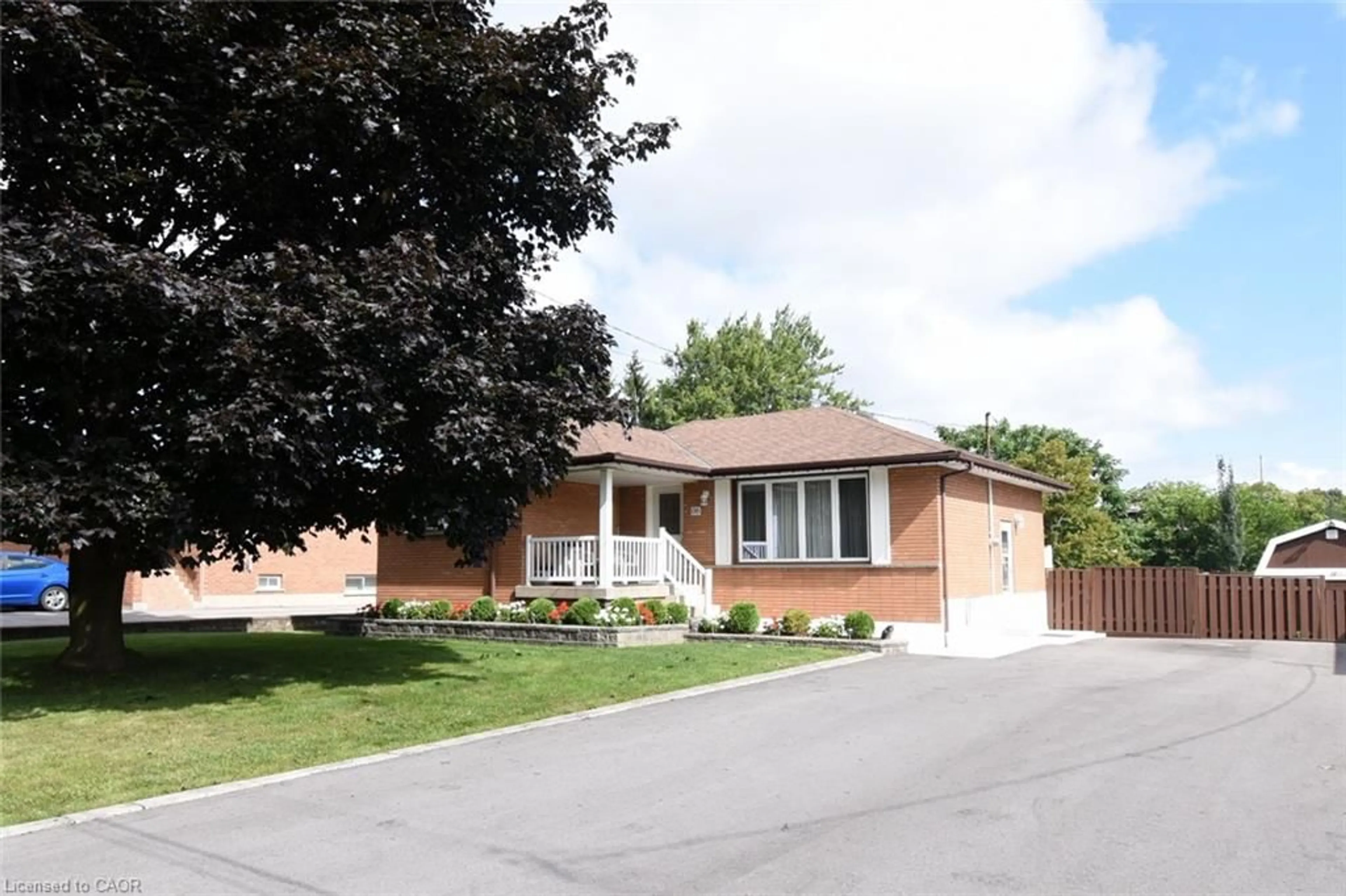 Home with brick exterior material, street for 98 Kennedy Ave, Hamilton Ontario L9B 1C7