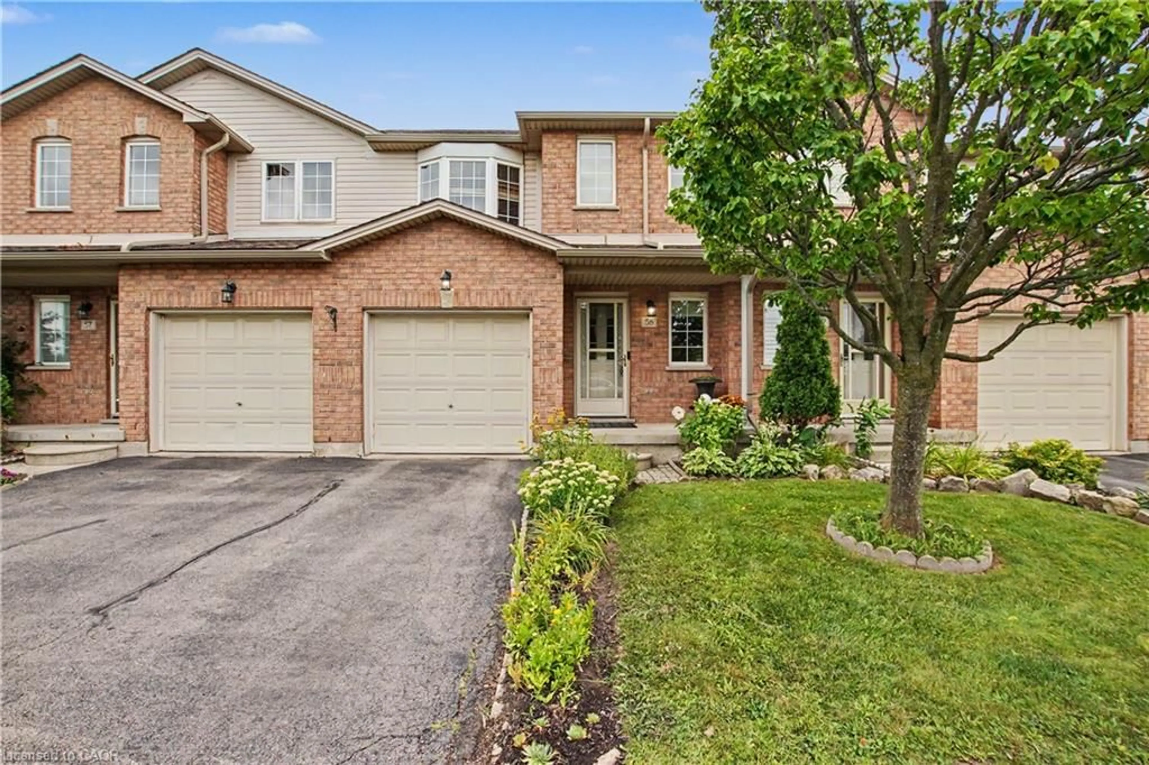 Home with brick exterior material, street for 800 Paramount Dr #58, Hamilton Ontario L8J 3V8