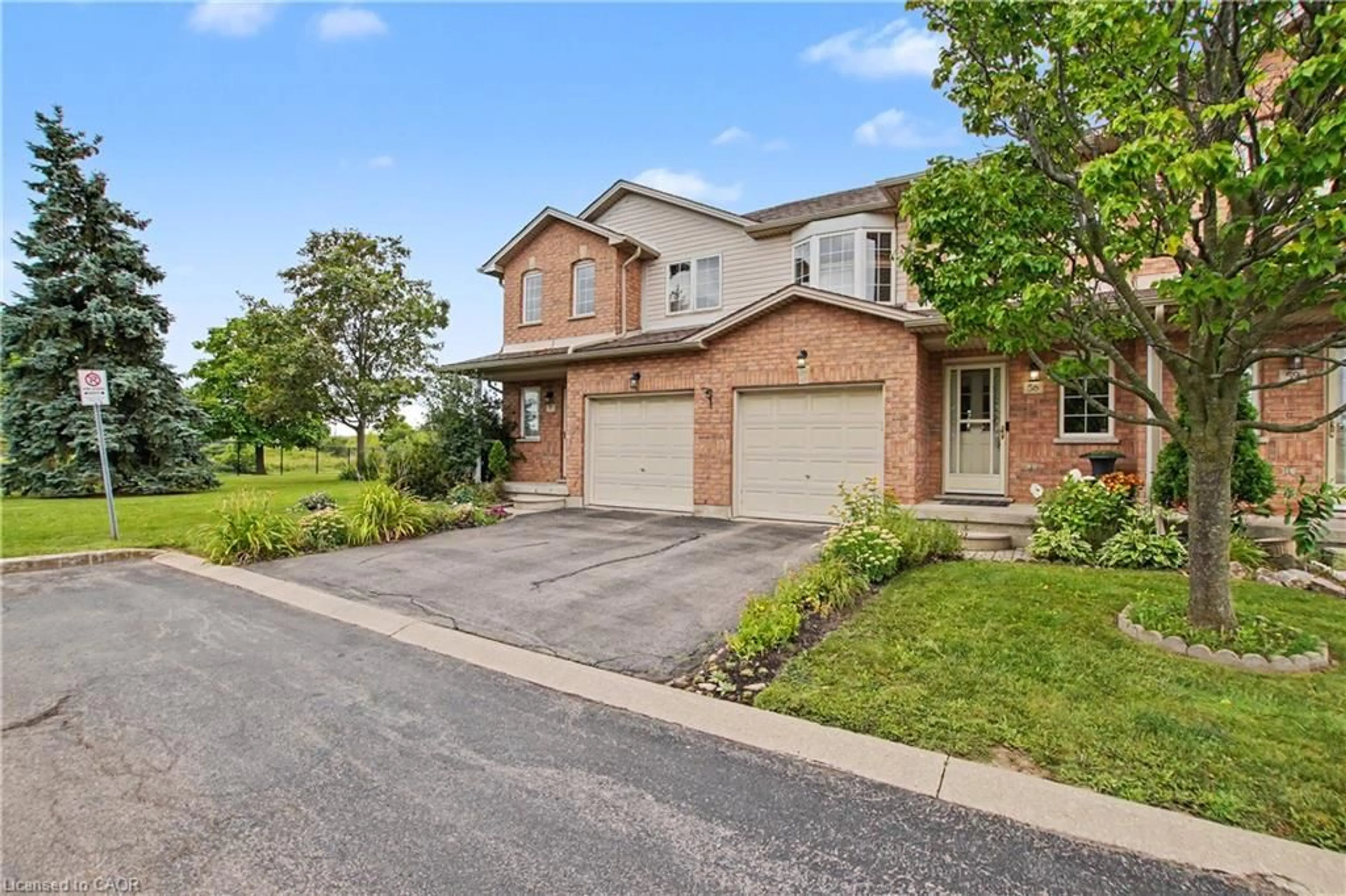 Home with brick exterior material, street for 800 Paramount Dr #58, Hamilton Ontario L8J 3V8