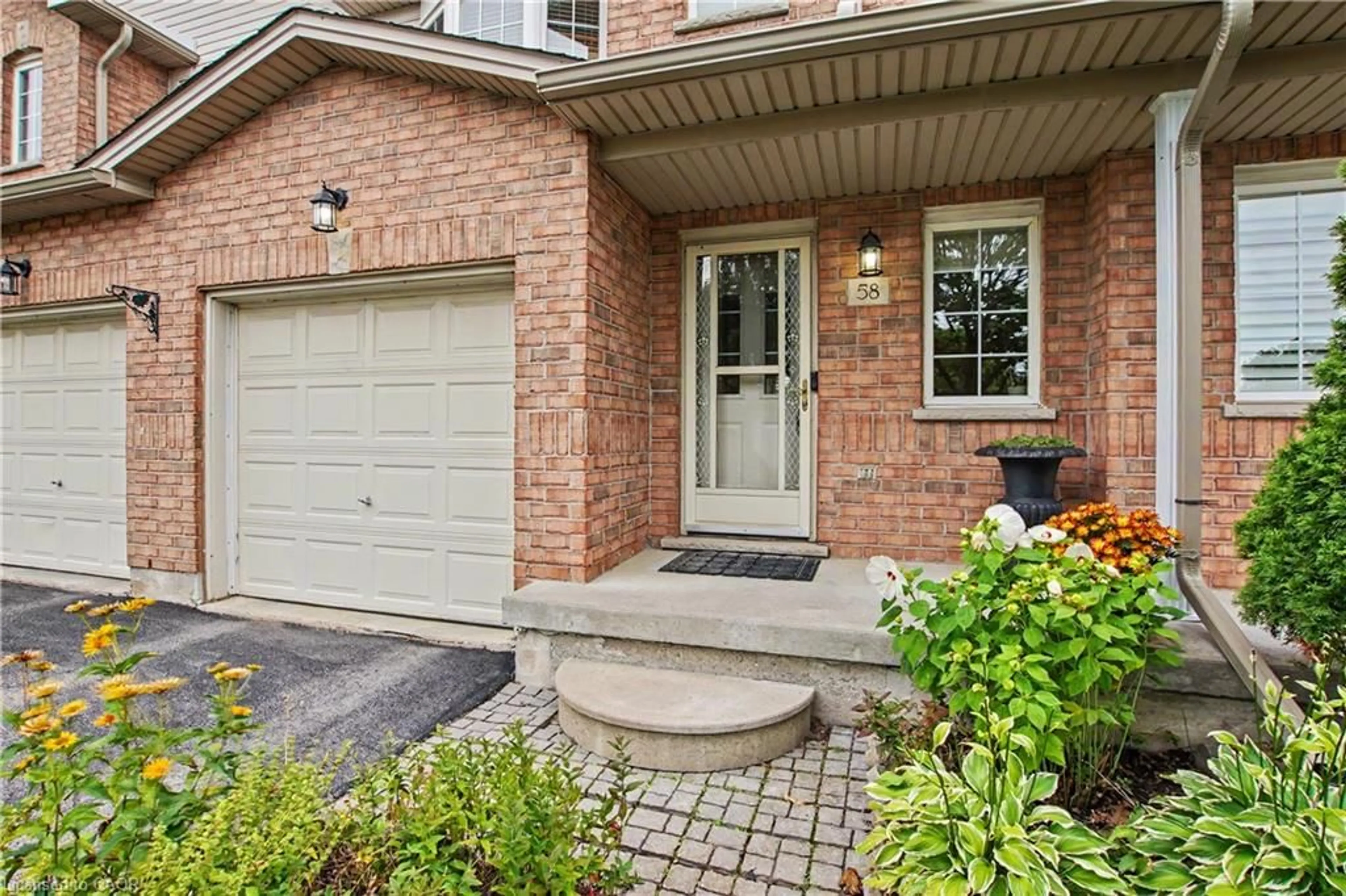 Home with brick exterior material, street for 800 Paramount Dr #58, Hamilton Ontario L8J 3V8