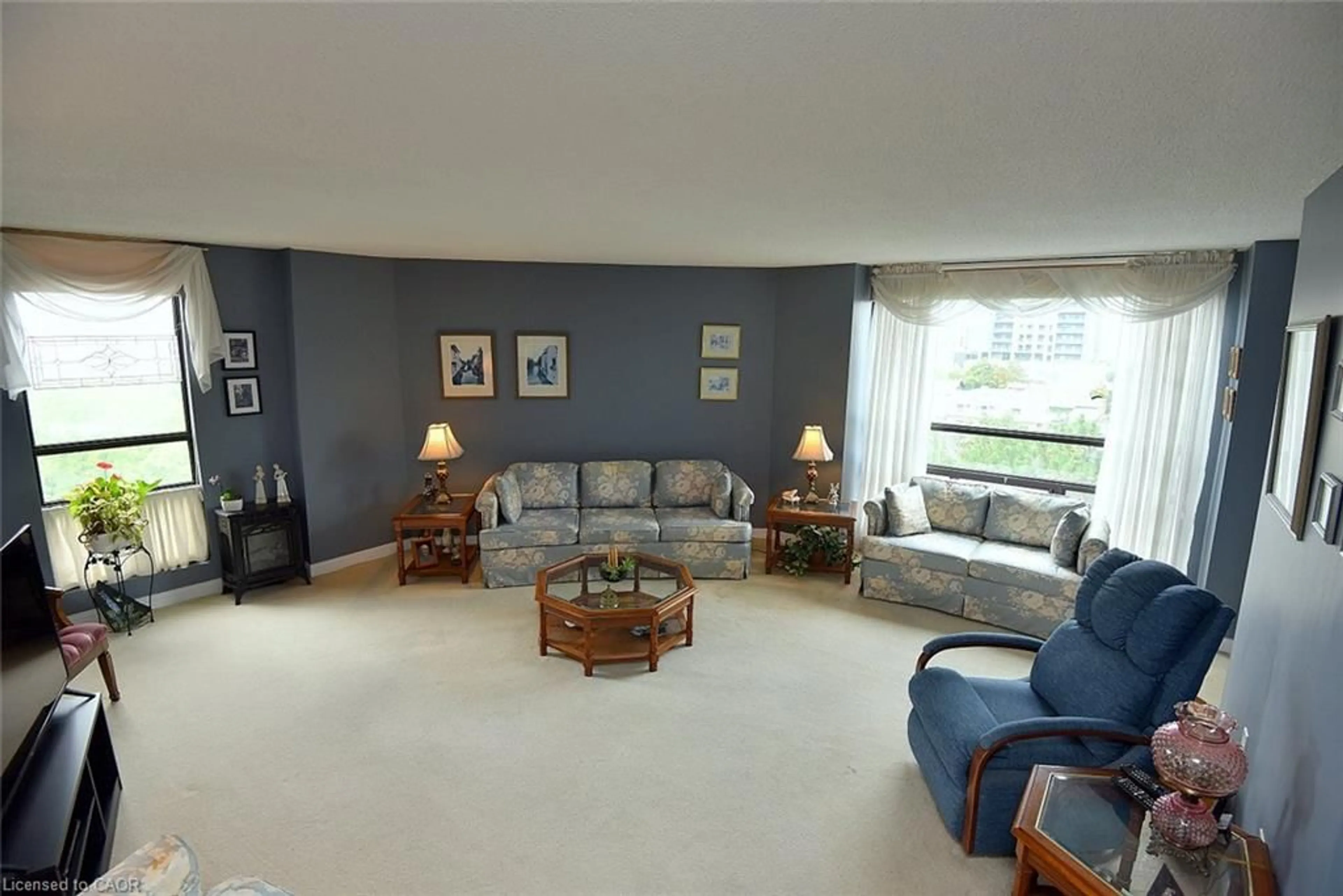 Living room with furniture, unknown for 222 Jackson St #706, Hamilton Ontario L8P 4S5