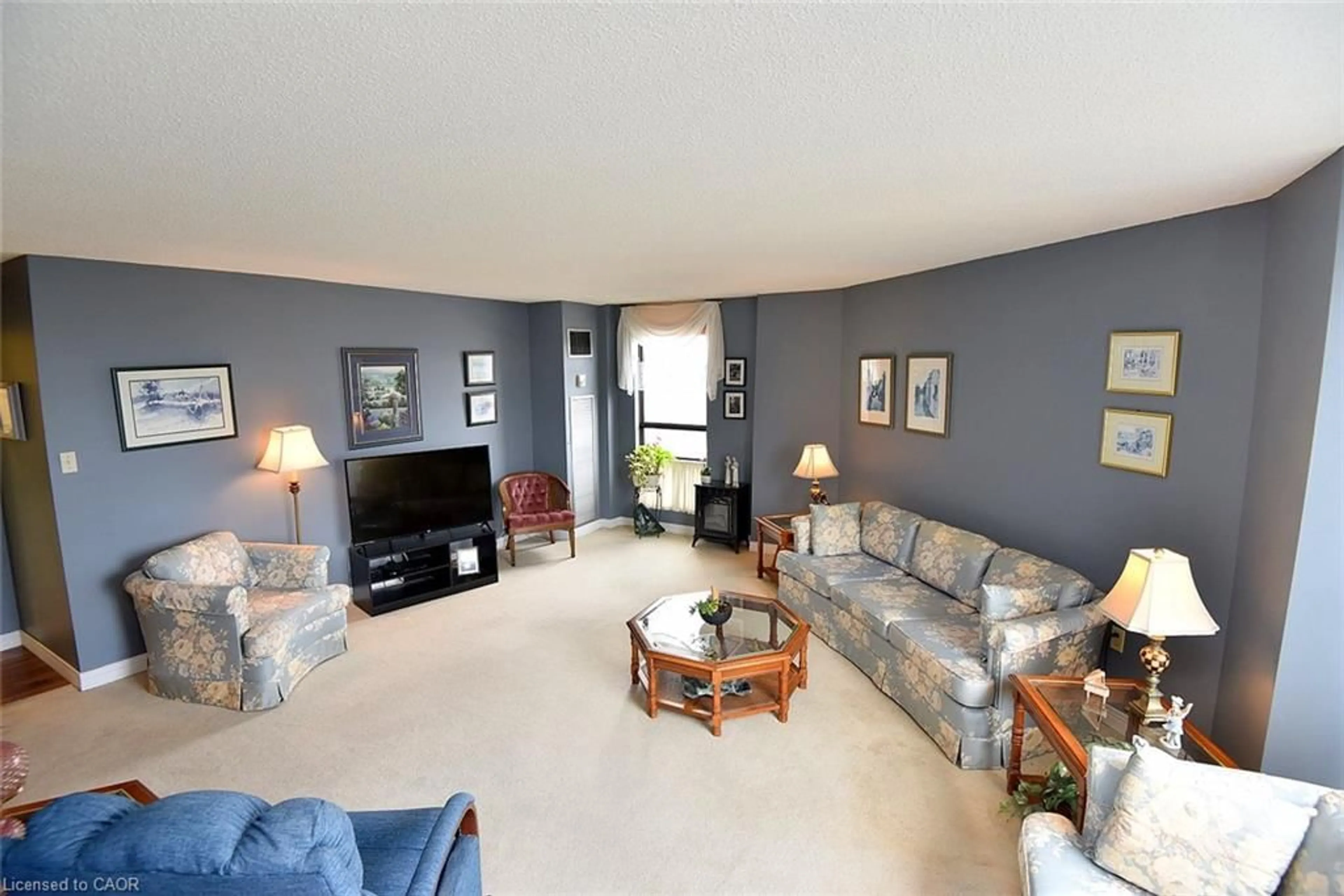 Living room with furniture, unknown for 222 Jackson St #706, Hamilton Ontario L8P 4S5