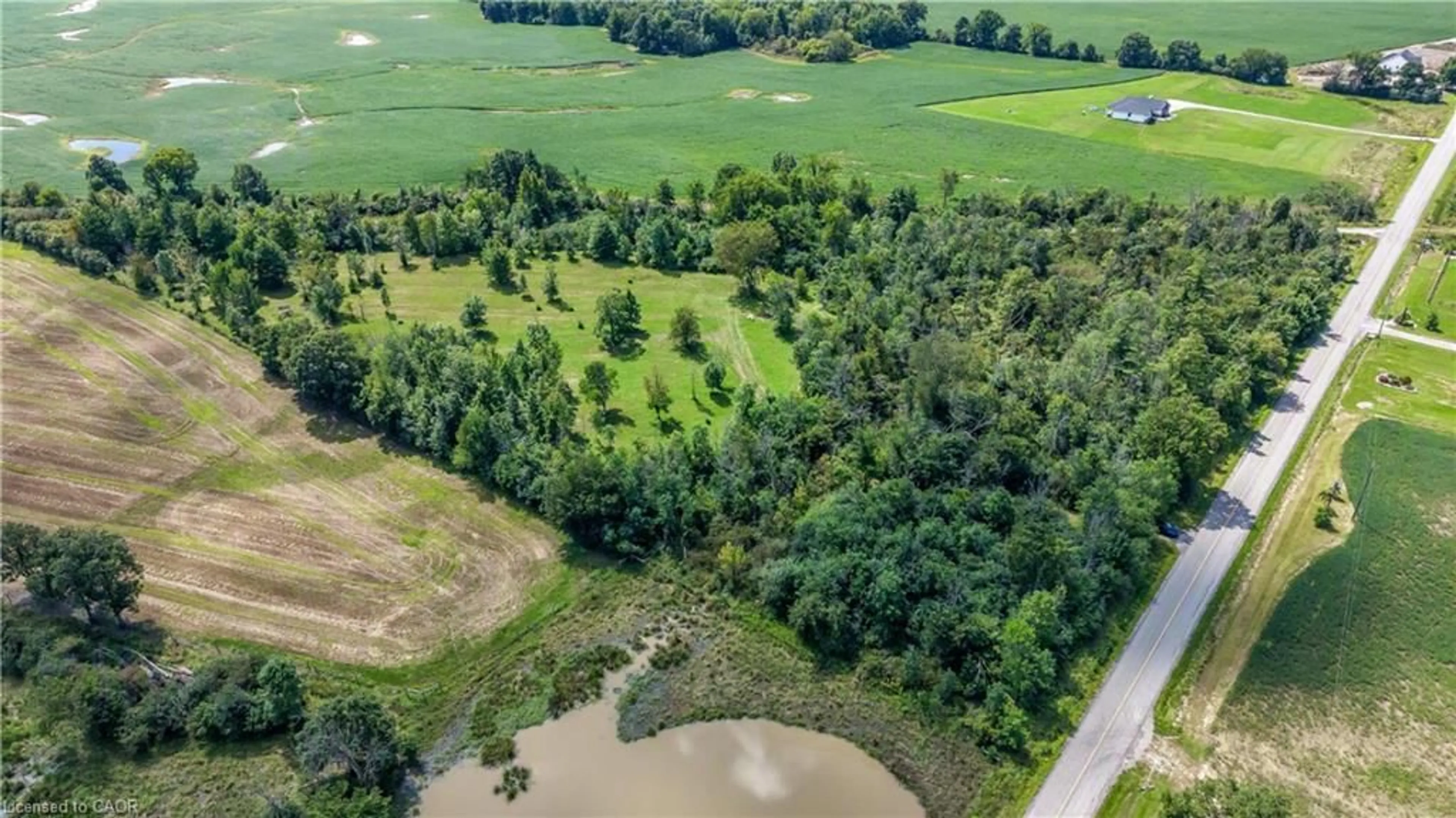 A pic from outside/outdoor area/front of a property/back of a property/a pic from drone, water/lake/river/ocean view for 1320 Concession 1 Rd, Canfield Ontario N0A 1C0