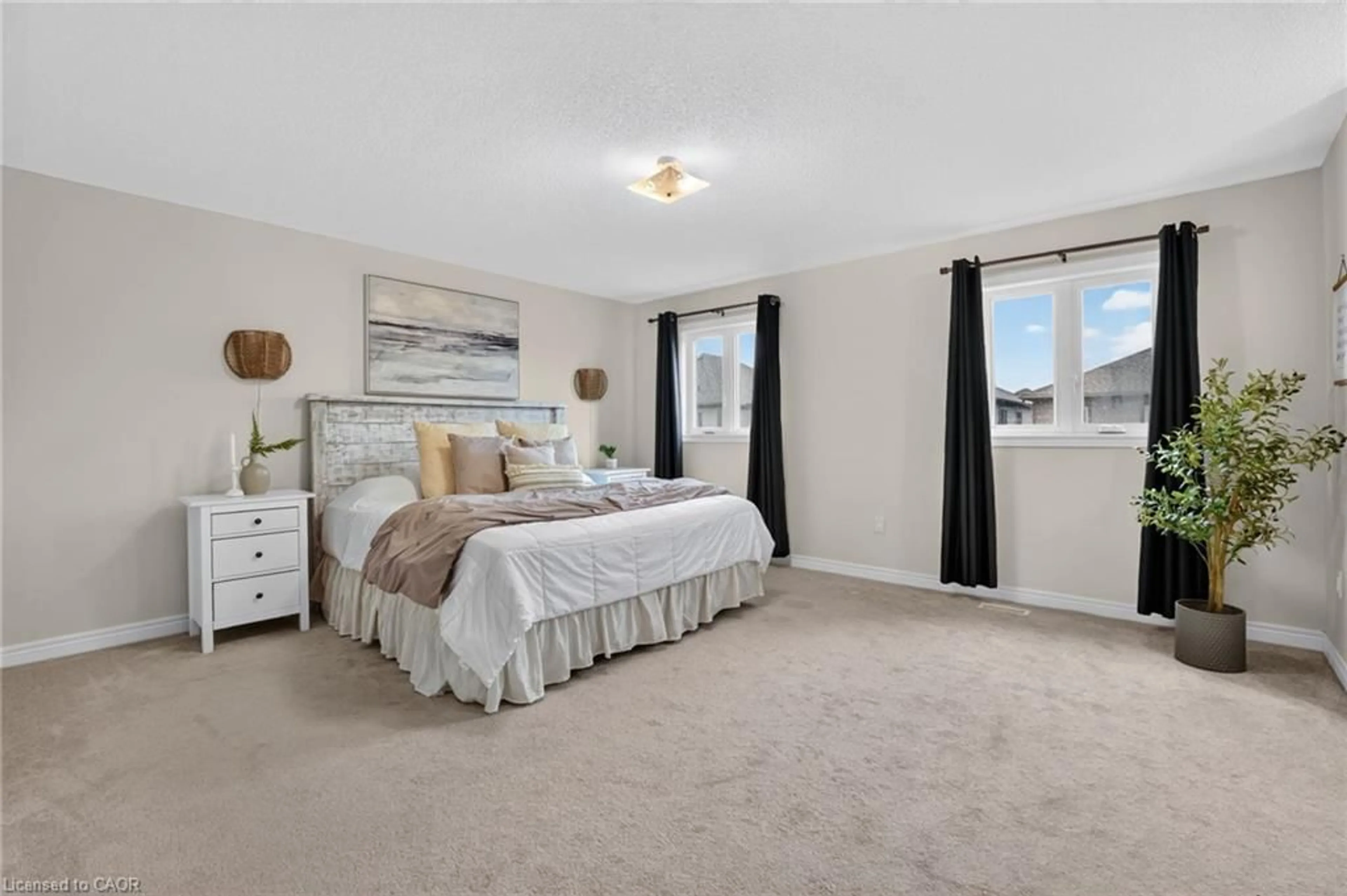 Bedroom with bed, carpet floor for 205 Shoreview Dr, Welland Ontario L3B 6H9