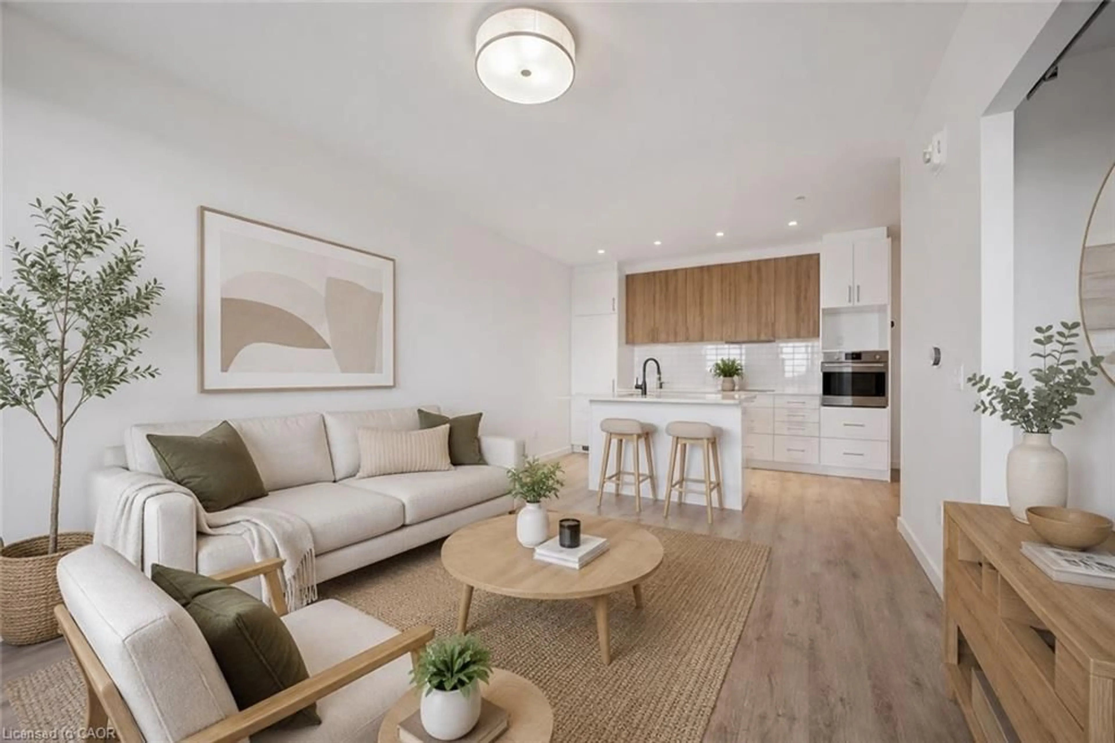 Living room with furniture, wood/laminate floor for 181 King St #1607, Waterloo Ontario N2J 0E7