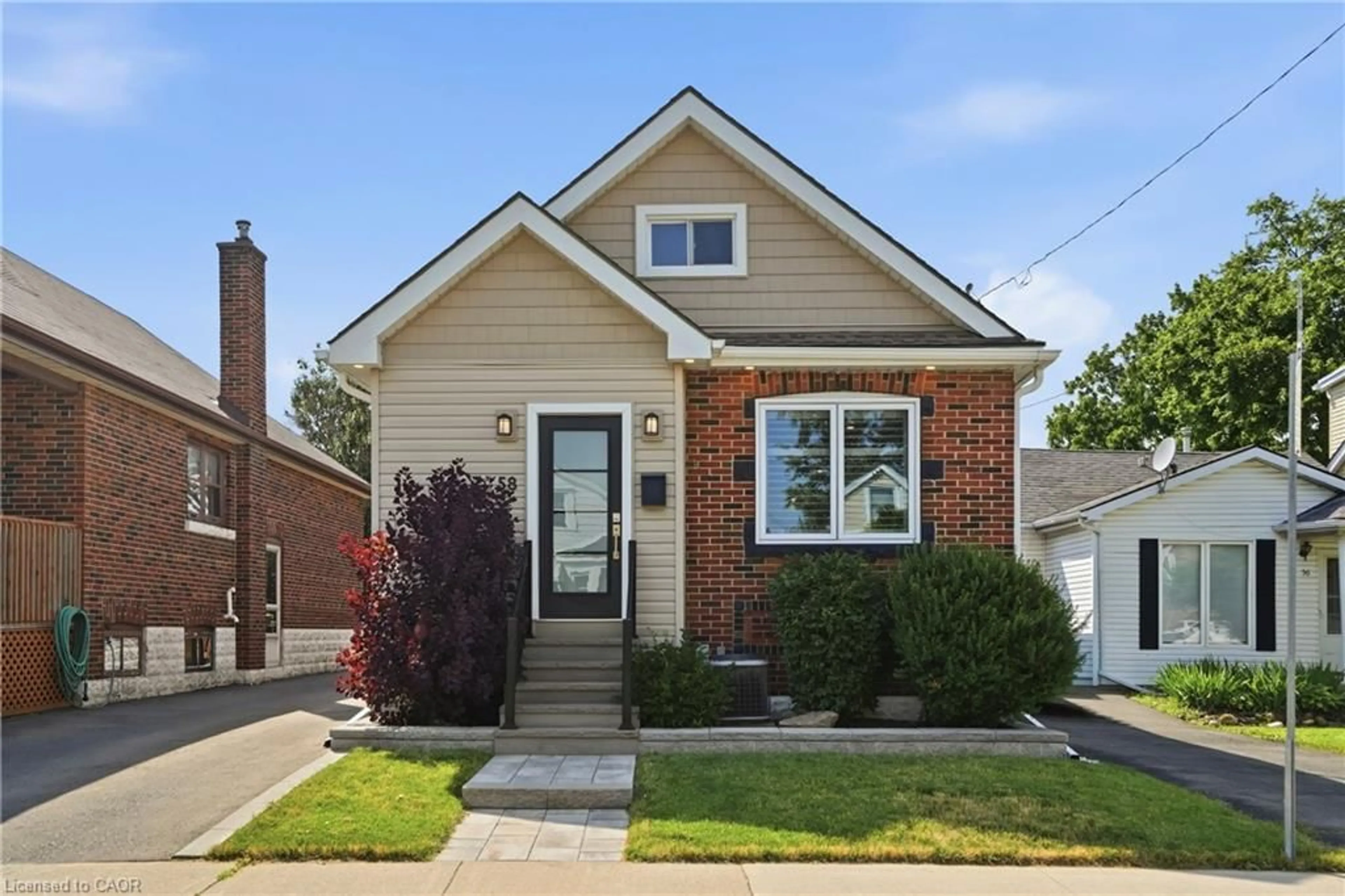 Home with brick exterior material, street for 58 Tragina Ave, Hamilton Ontario L8K 2Z3