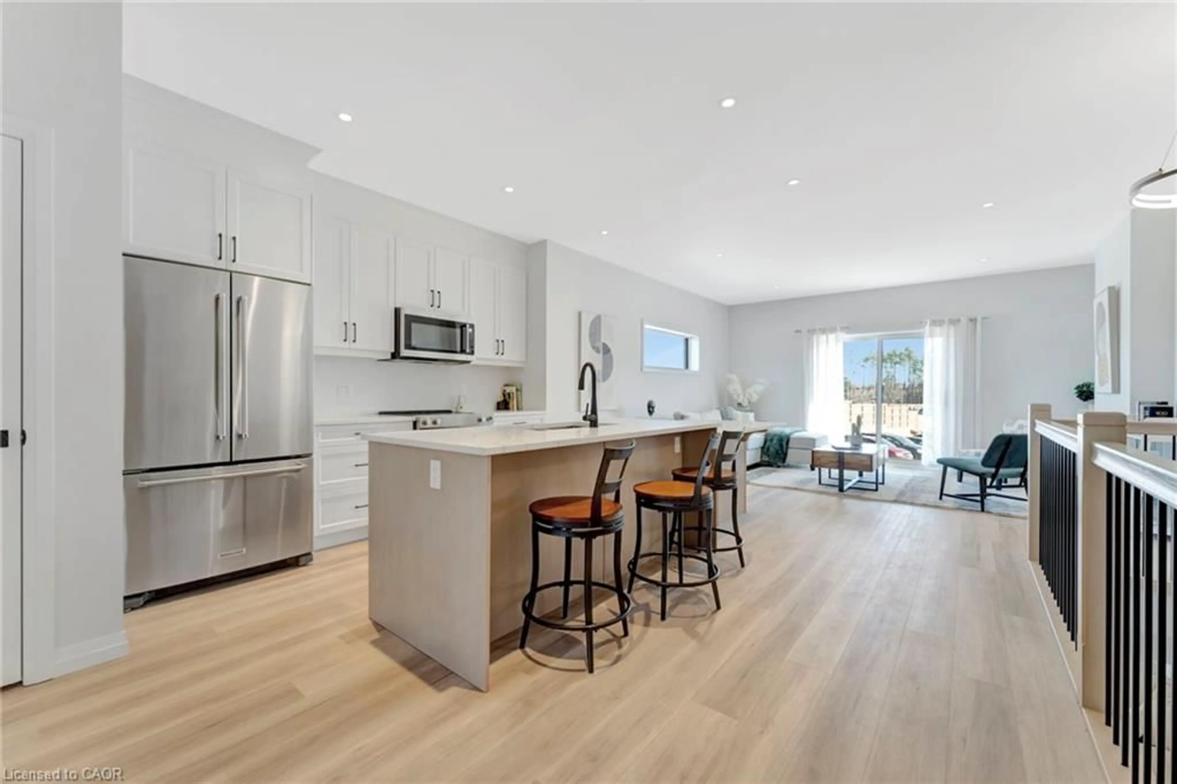 Open concept kitchen, wood/laminate floor for 58 Robins Pl, Simcoe Ontario N3Y 0E3