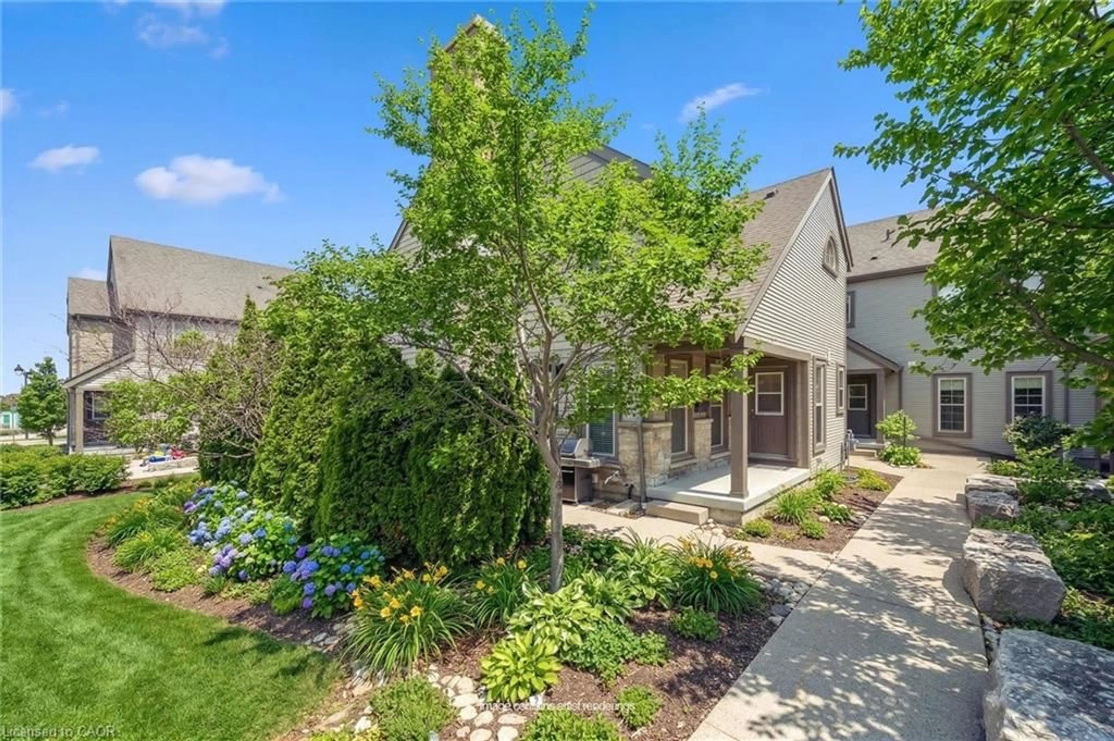 A pic from outside/outdoor area/front of a property/back of a property/a pic from drone, street for 100 Frederick Dr #9, Guelph Ontario N1L 0H6