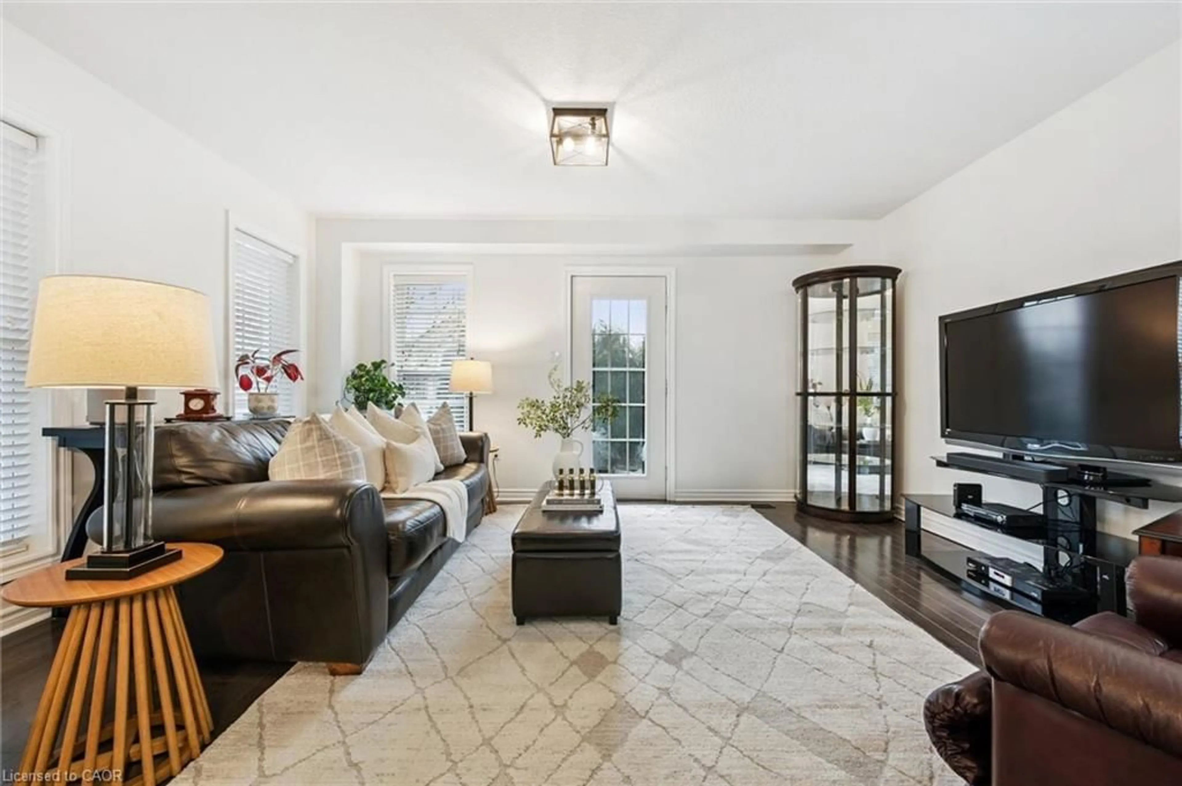 Living room with furniture, ceramic/tile floor for 100 Frederick Dr #9, Guelph Ontario N1L 0H6