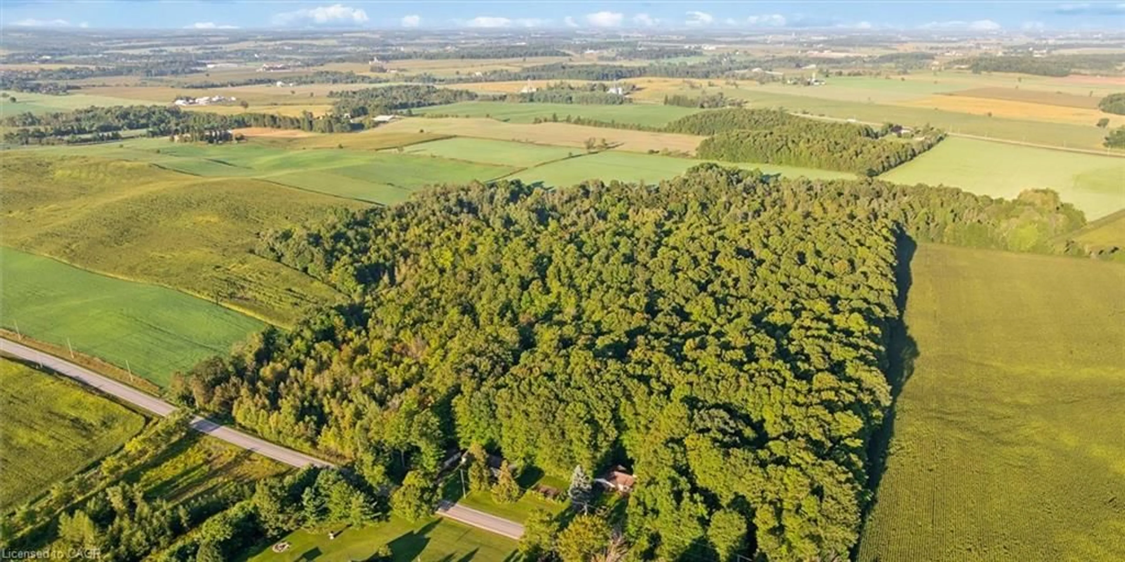 A pic from outside/outdoor area/front of a property/back of a property/a pic from drone, forest/trees view for 2018 Greenwood Hill Rd, Wellesley Ontario N0B 2T0