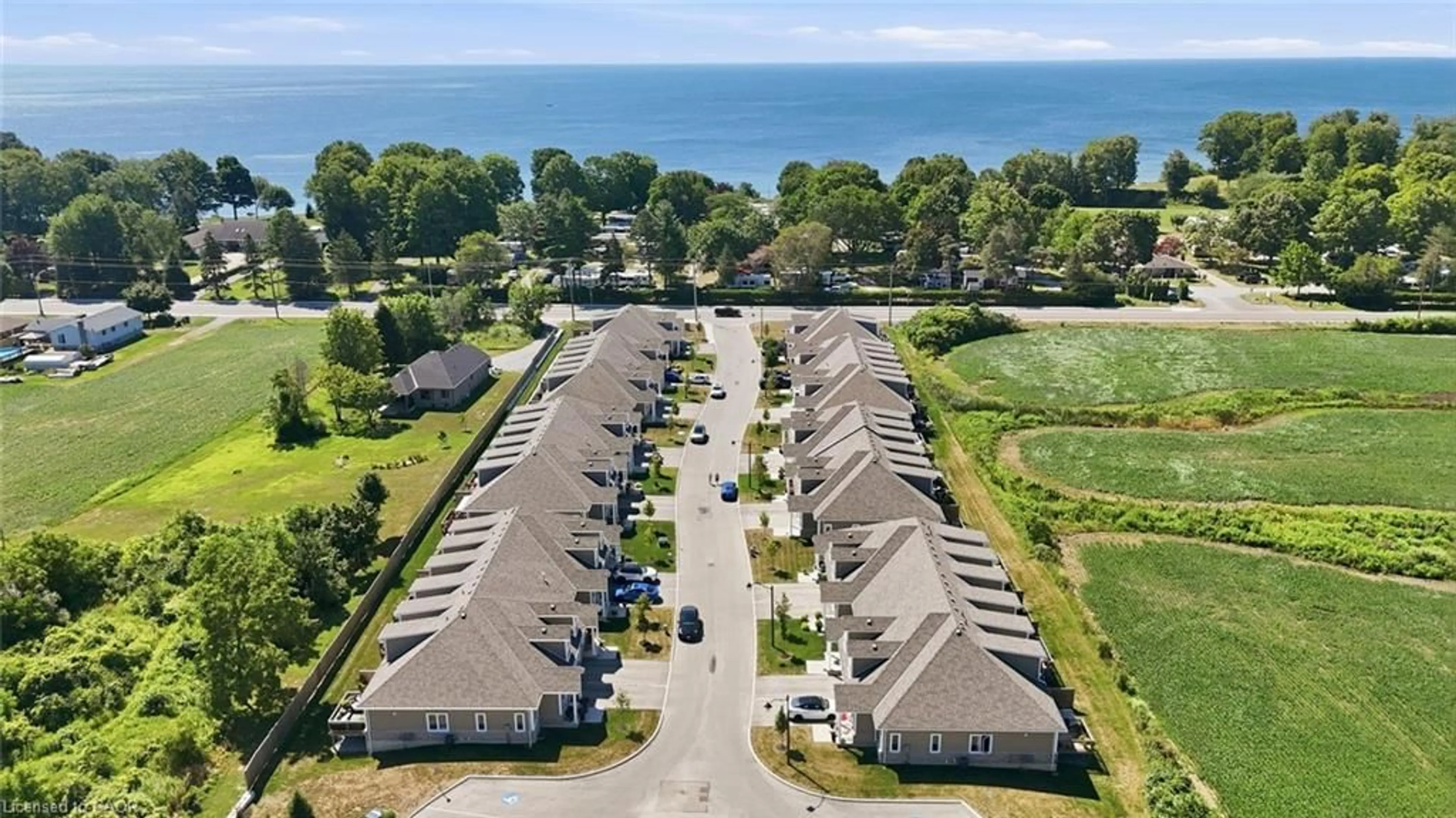 A pic from outside/outdoor area/front of a property/back of a property/a pic from drone, water/lake/river/ocean view for 744 Nelson St #10, Port Dover Ontario N0A 1N0